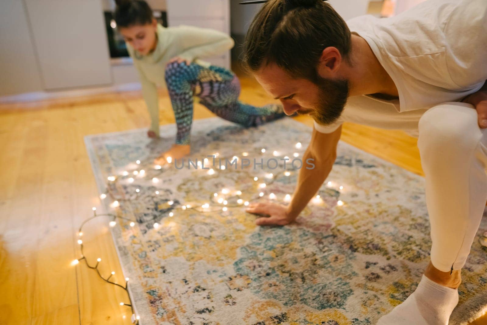 A joyful family scene with playful children and twinkling fairy lights, creating a warm atmosphere of happiness