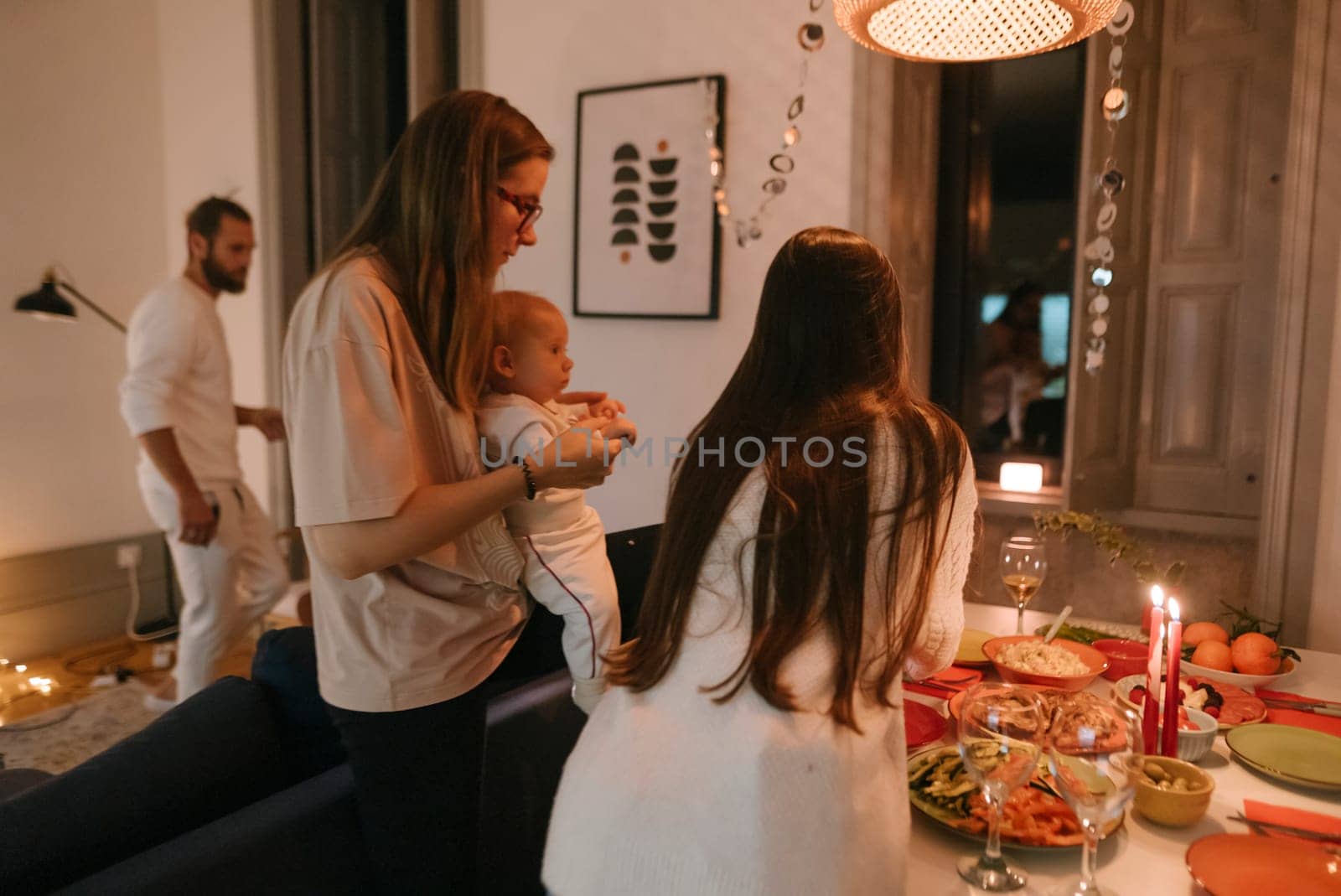 A warm family scene where loved ones share a festive dinner, showcasing love, warmth, and togetherness