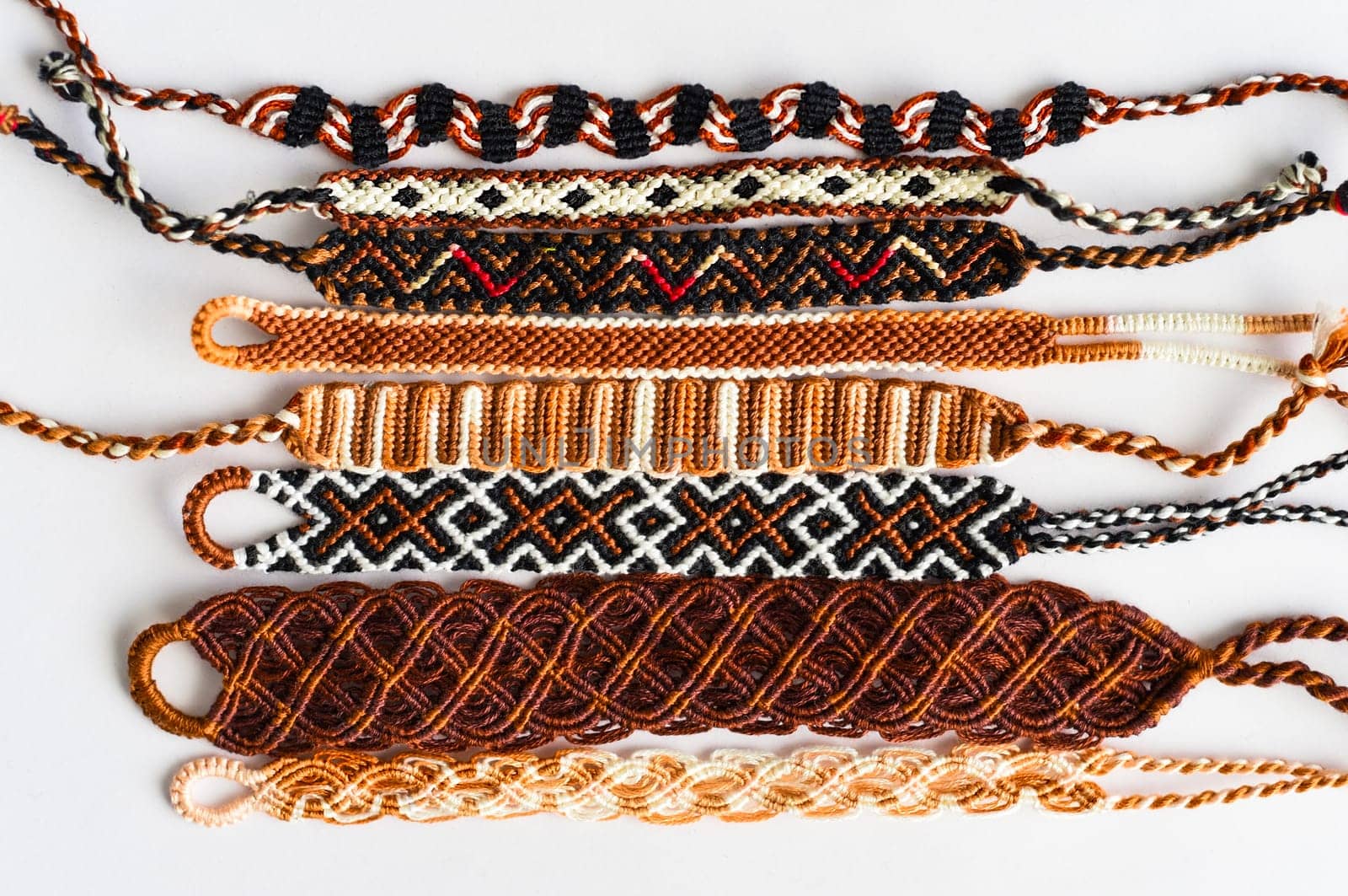 DIY woven friendship bracelets with different braiding. Summer accessory