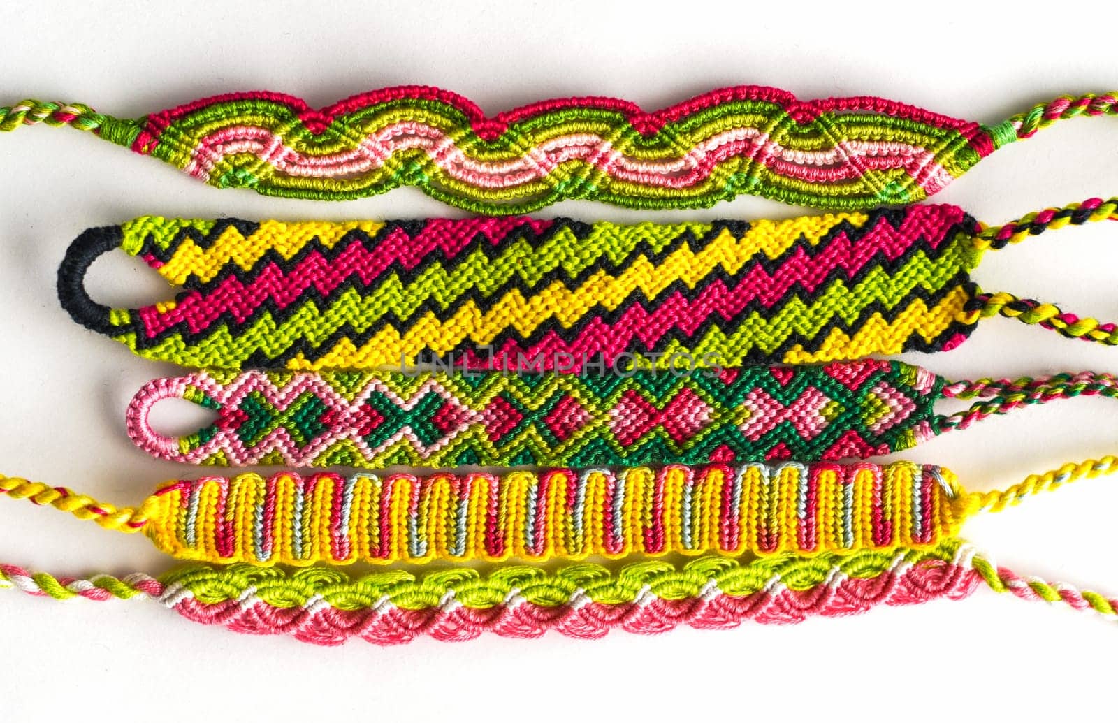 DIY woven friendship bracelets with different braiding. Summer accessory