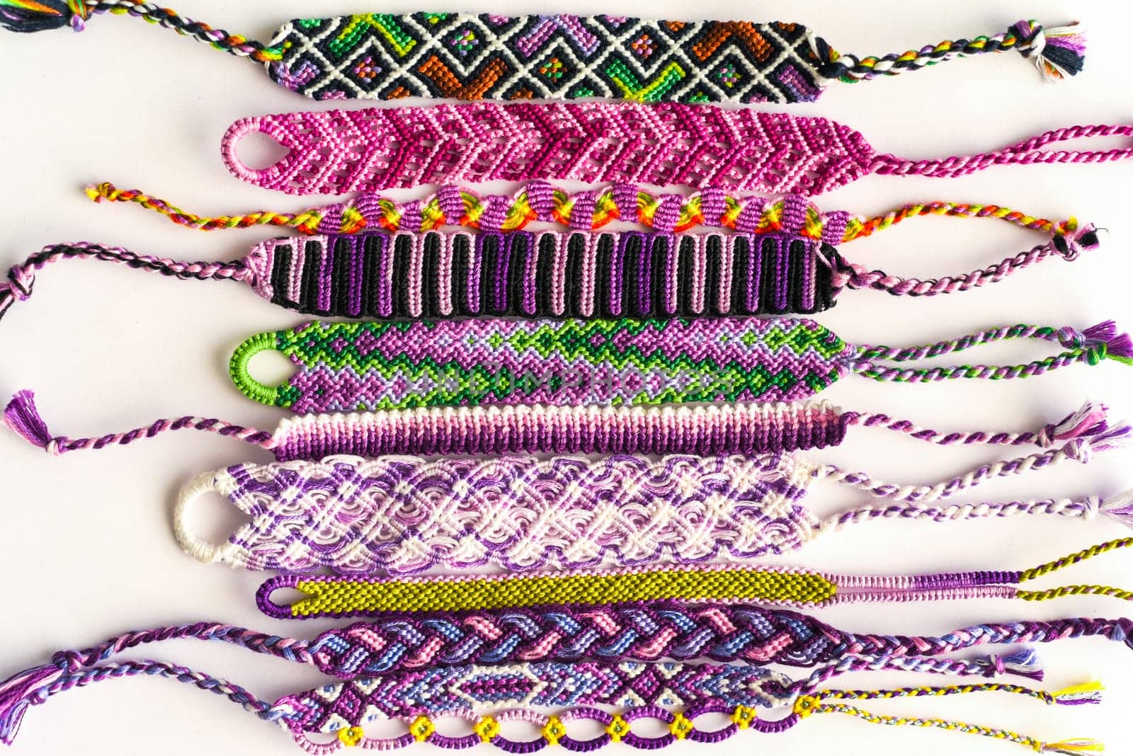 DIY woven friendship bracelets with different braiding. Summer accessory