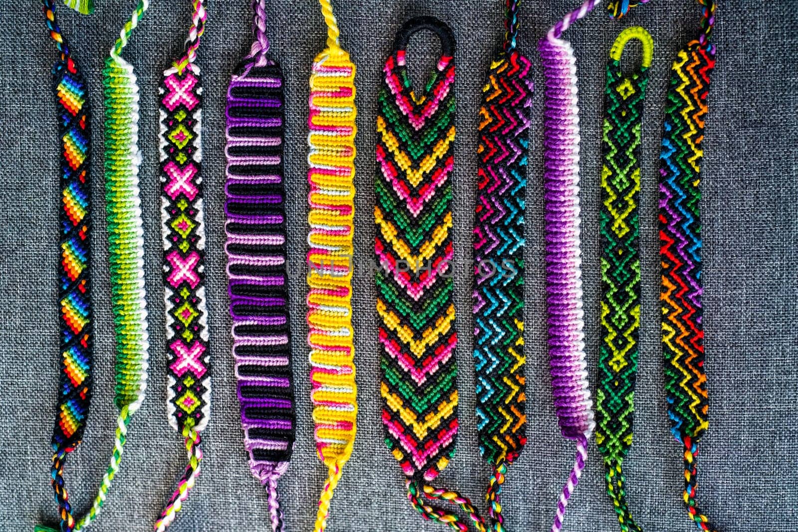 DIY woven friendship bracelets with different braiding. Summer accessory