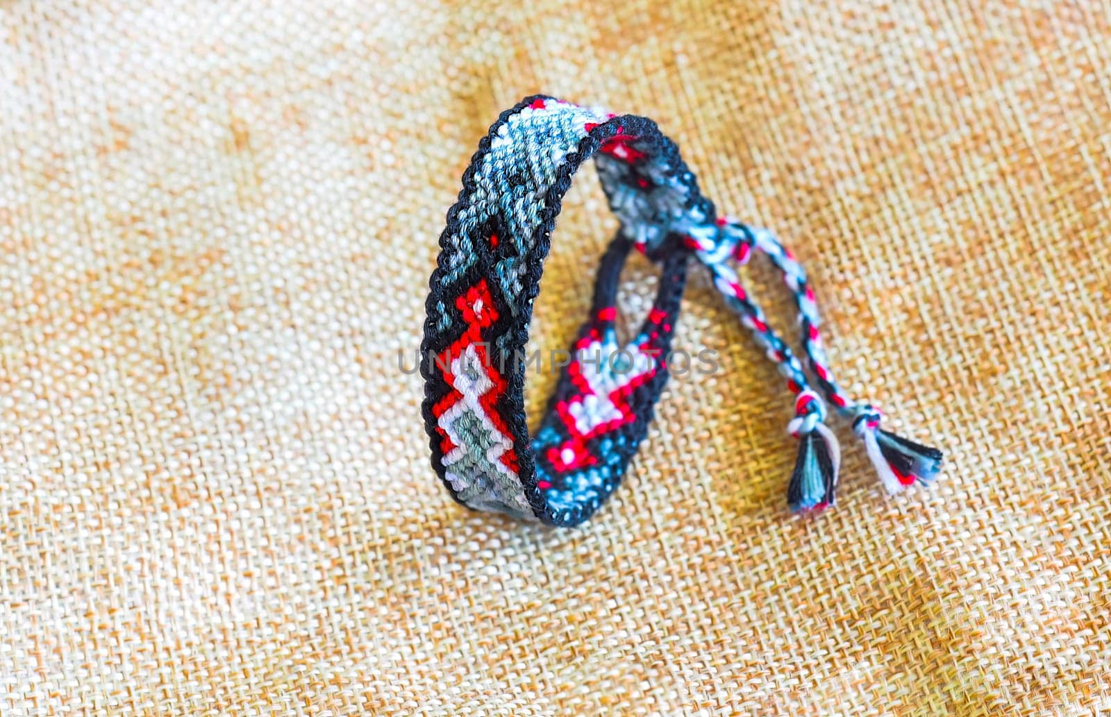 DIY woven tied friendship bracelet. Summer accessory