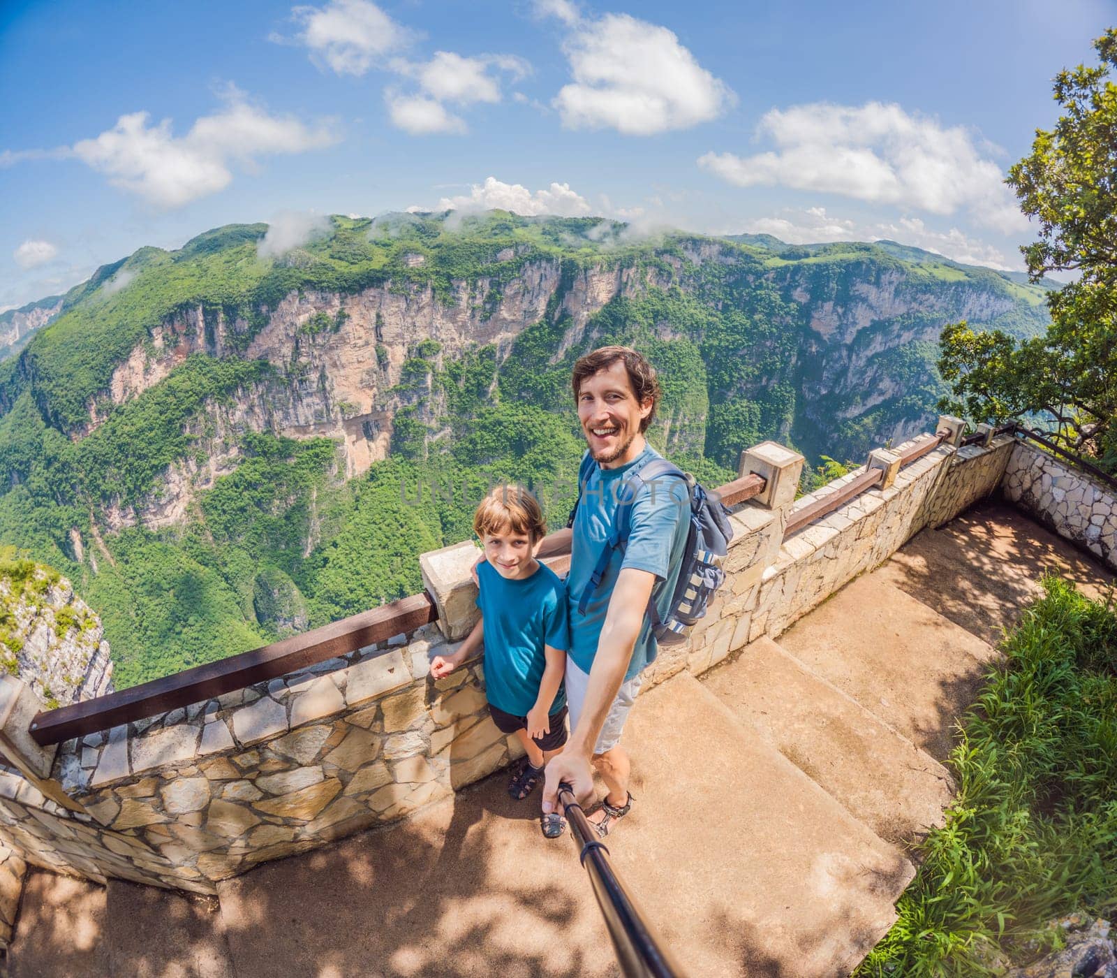 Father and son exploring Sumidero Canyon, Mexico. Family adventure in nature with breathtaking river views, towering cliffs, and lush scenery. Concept of bonding, outdoor exploration, and eco-tourism.