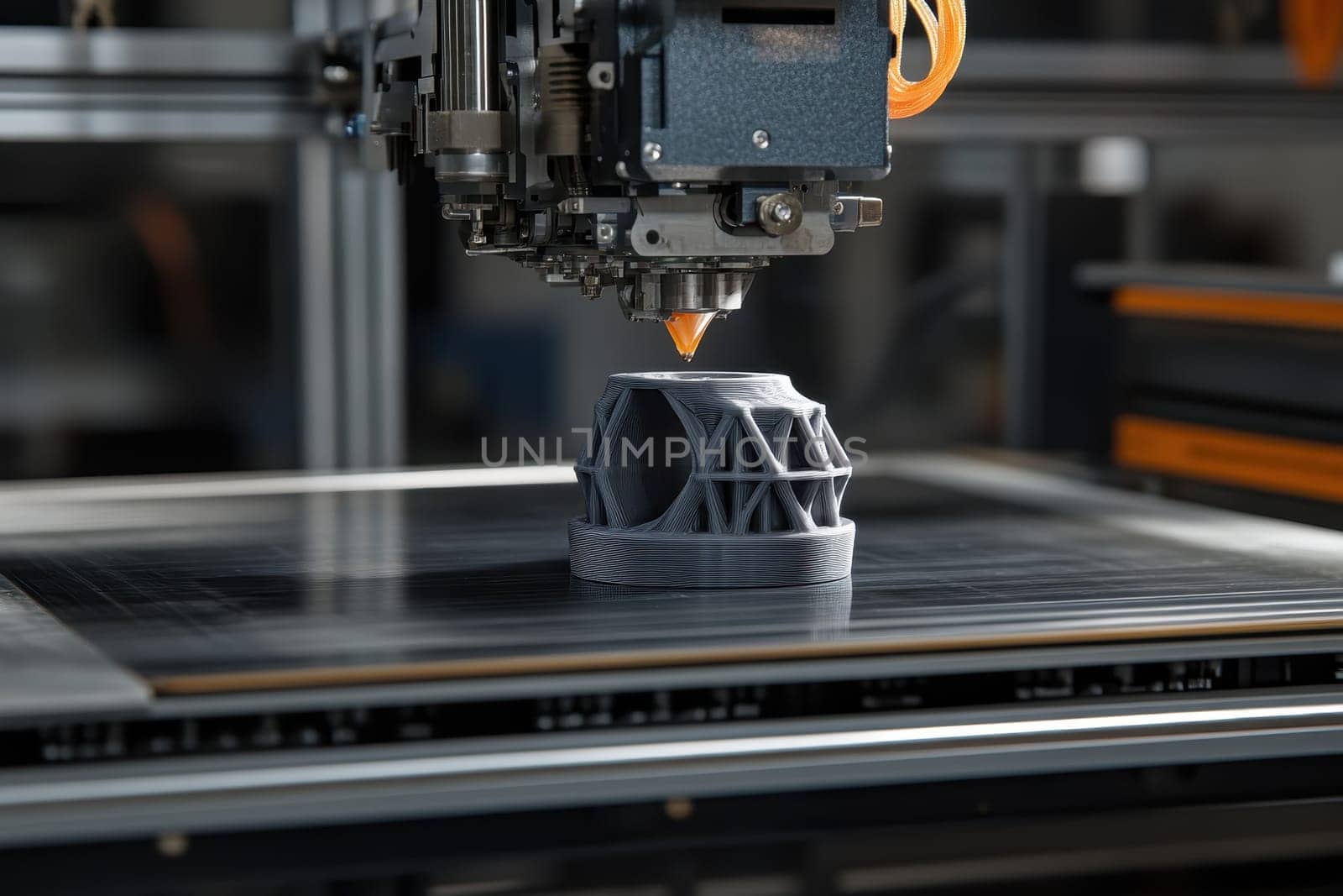 A 3D printer captures attention as it constructs a geometric object with filament. The intricate design showcases modern technology and precision in a creative workspace.