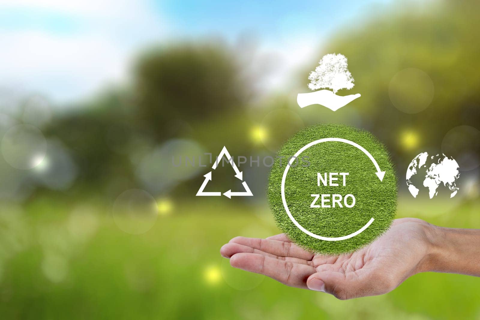 The human hand shows a sign of net zero for decreased CO2. Concepts of environmental protection, climate change, global warming, recycling, or carbon neutral