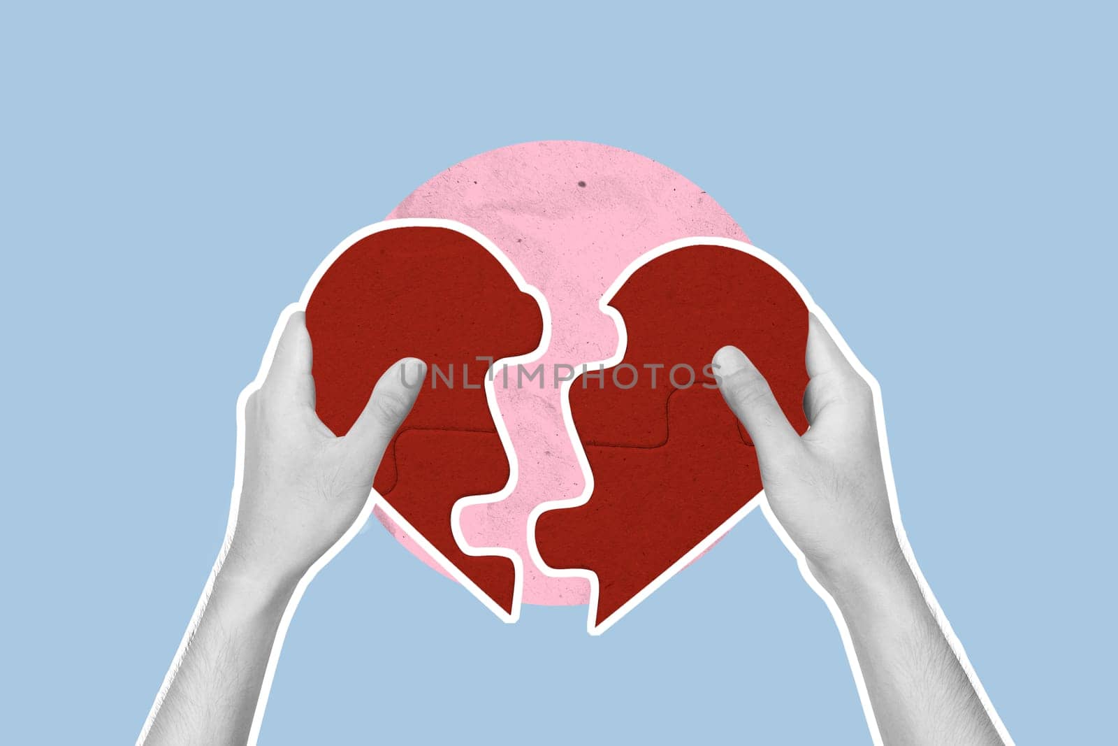 A human hand builds a puzzle of a red heart on a colored background. Concept of Valentine Day. Collage art