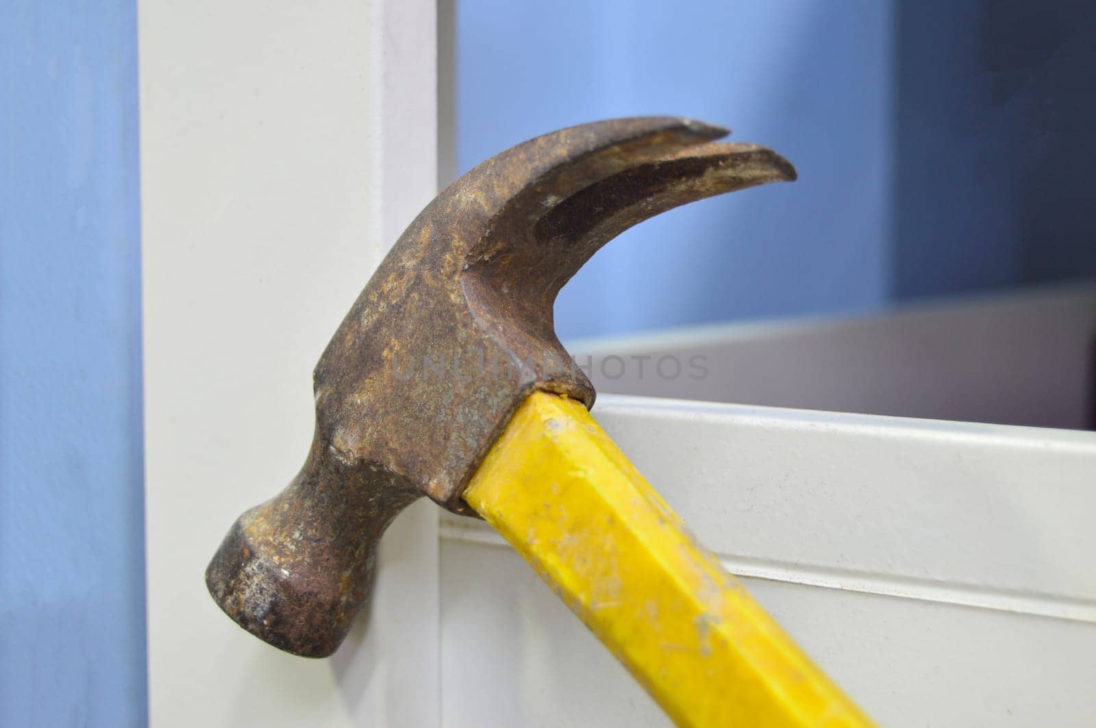 Close-up photo of hammer head, old condition.