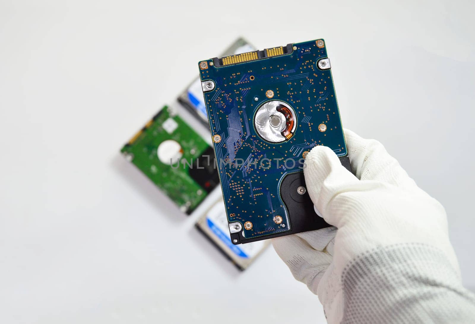 Hard disk drives are still widely used. placed on a white background)