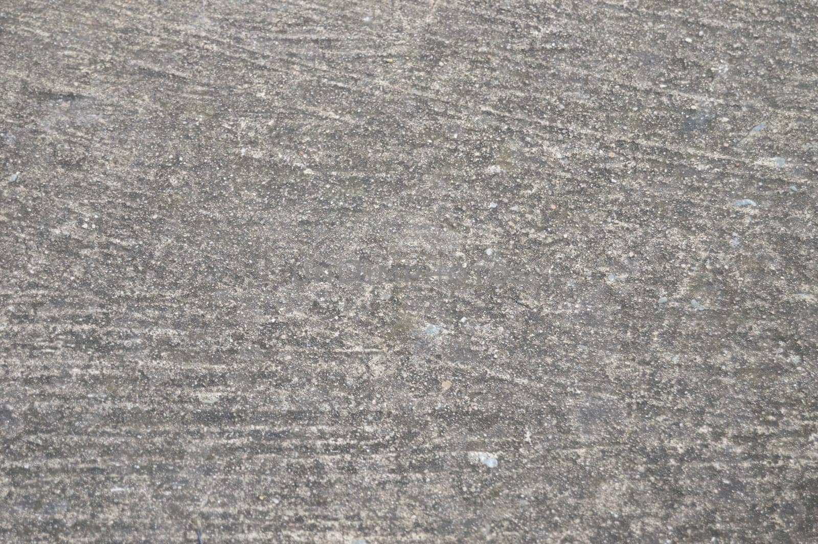 Rough cement surface, used as a background image.