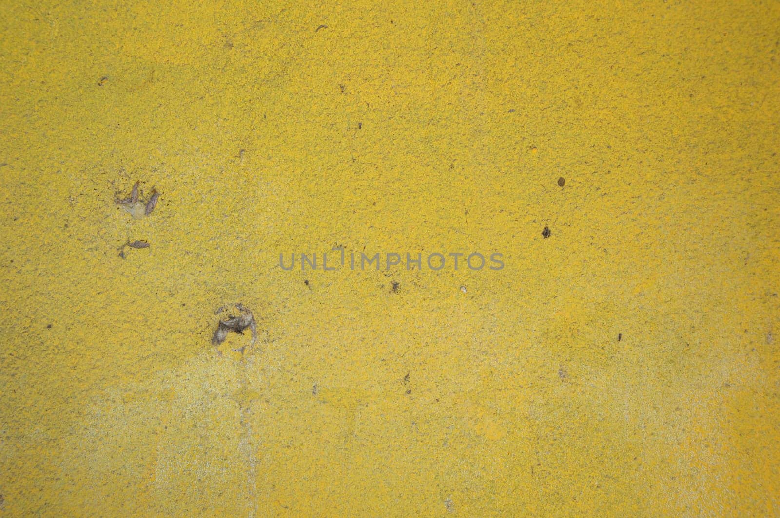 The yellow walls are dirty and old. use as wallpaper