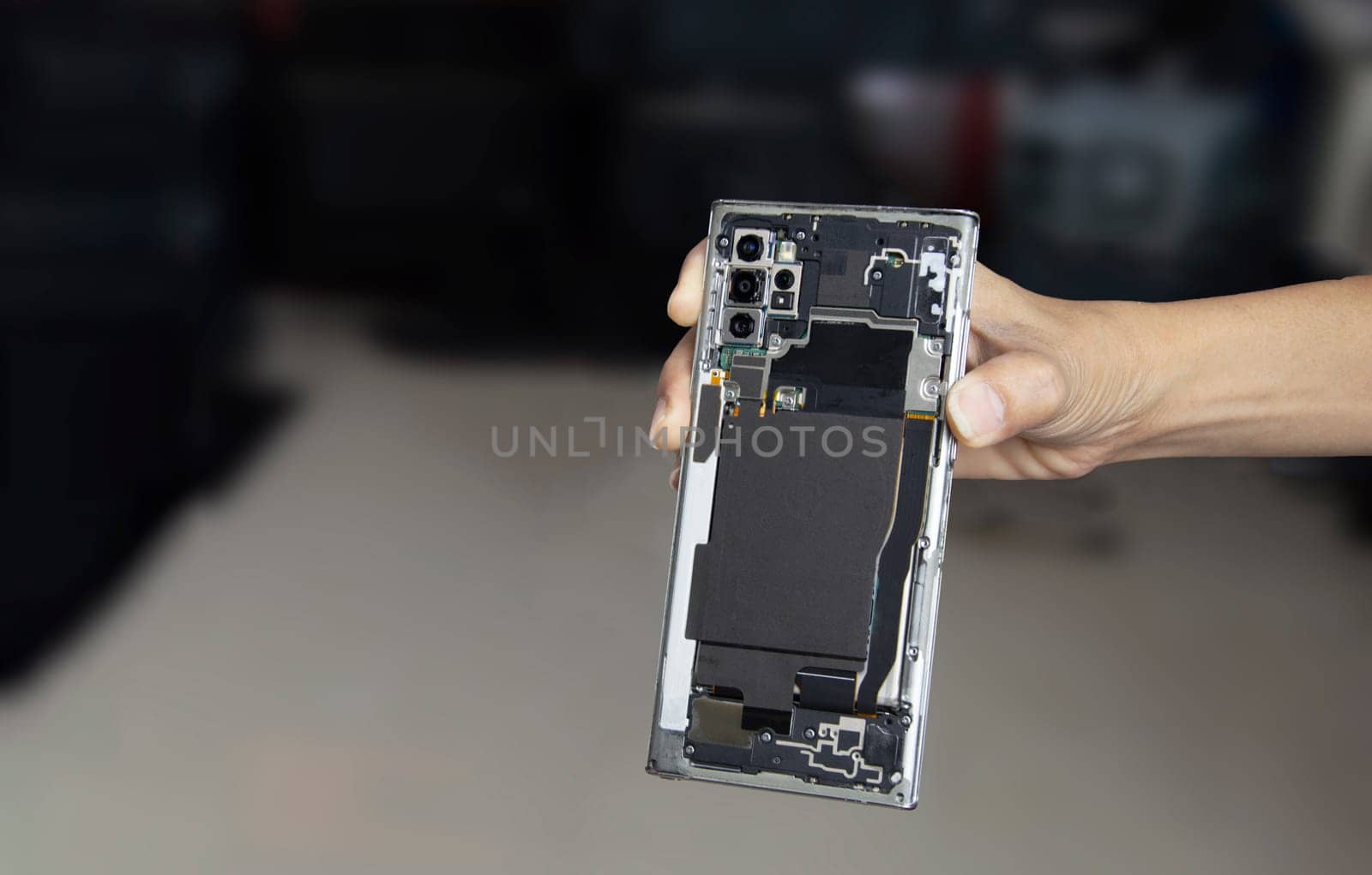 Picture of a smartphone removed from the back, smartphone repair (with clipping path)