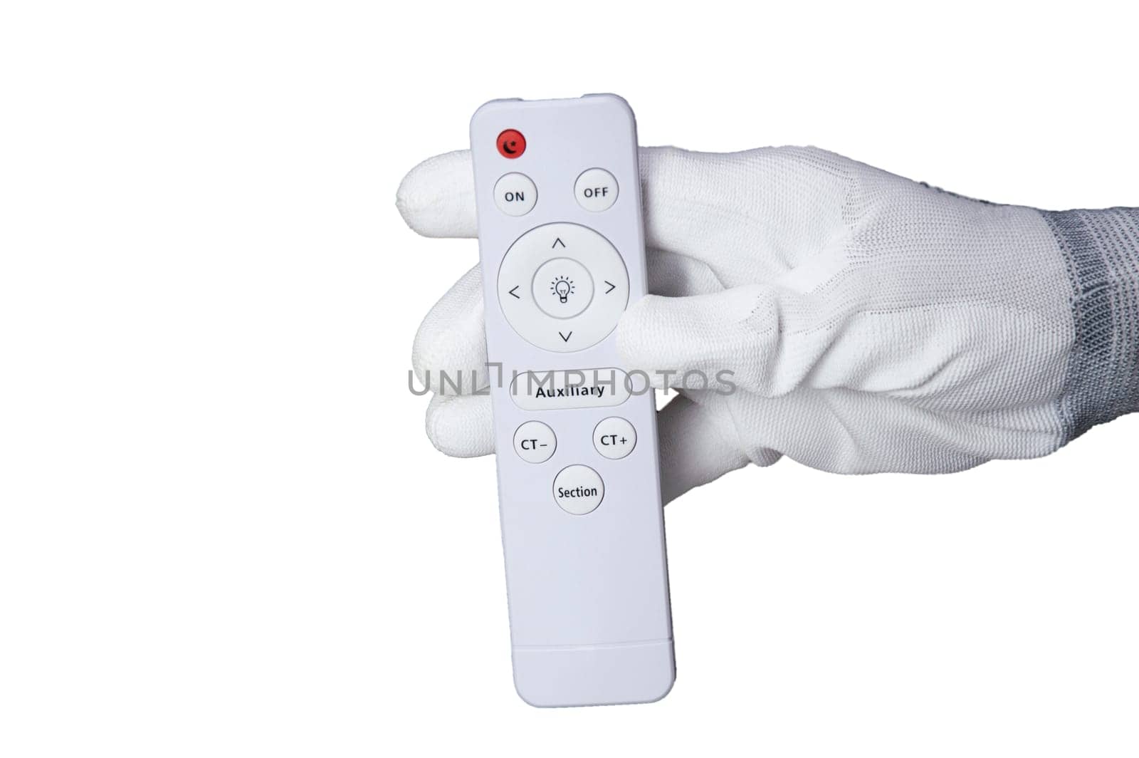 Picture of a white remote control in hand by boonruen