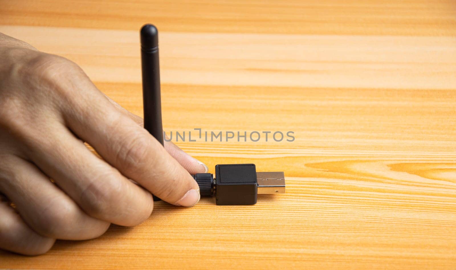 USB WiFi black wooden floor by boonruen