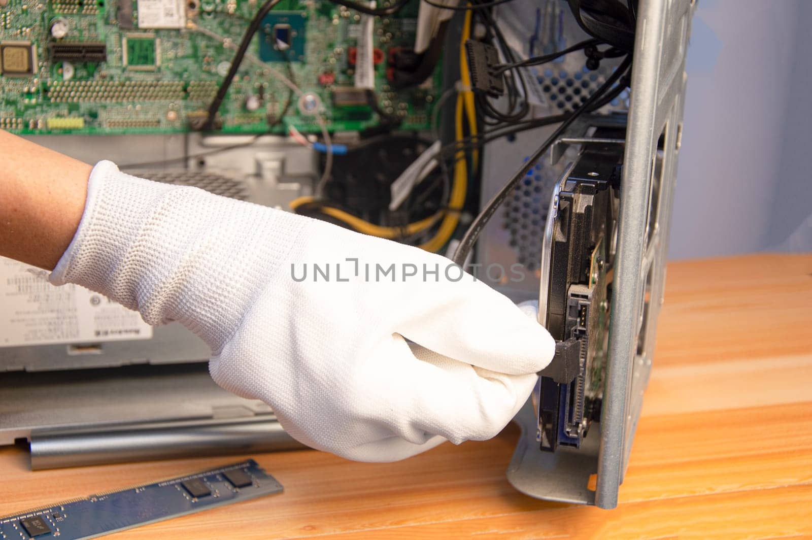 side view technician repairing computer