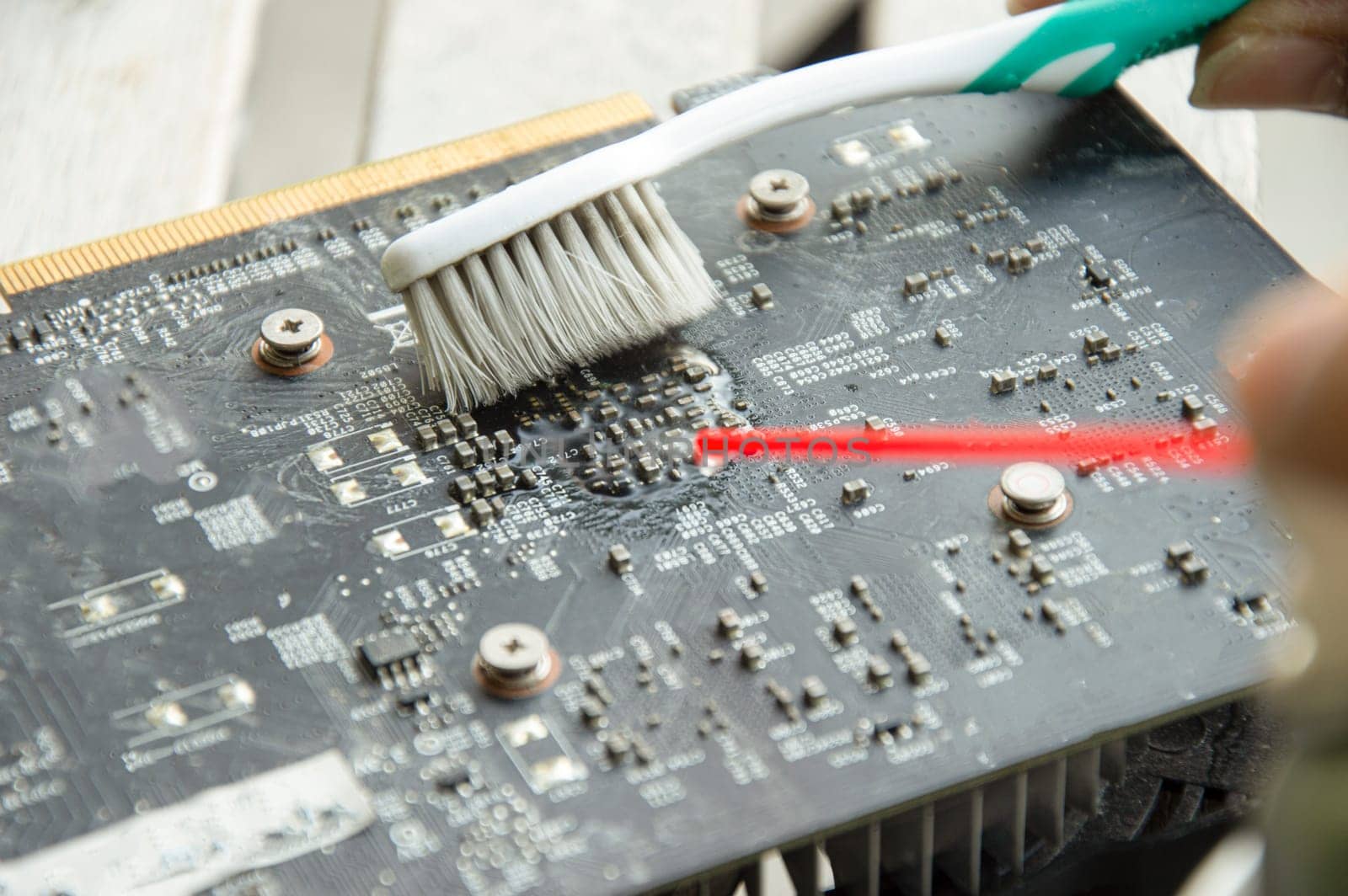 mechanic's point of view Use a spray and brush to clean the graphics card. by boonruen