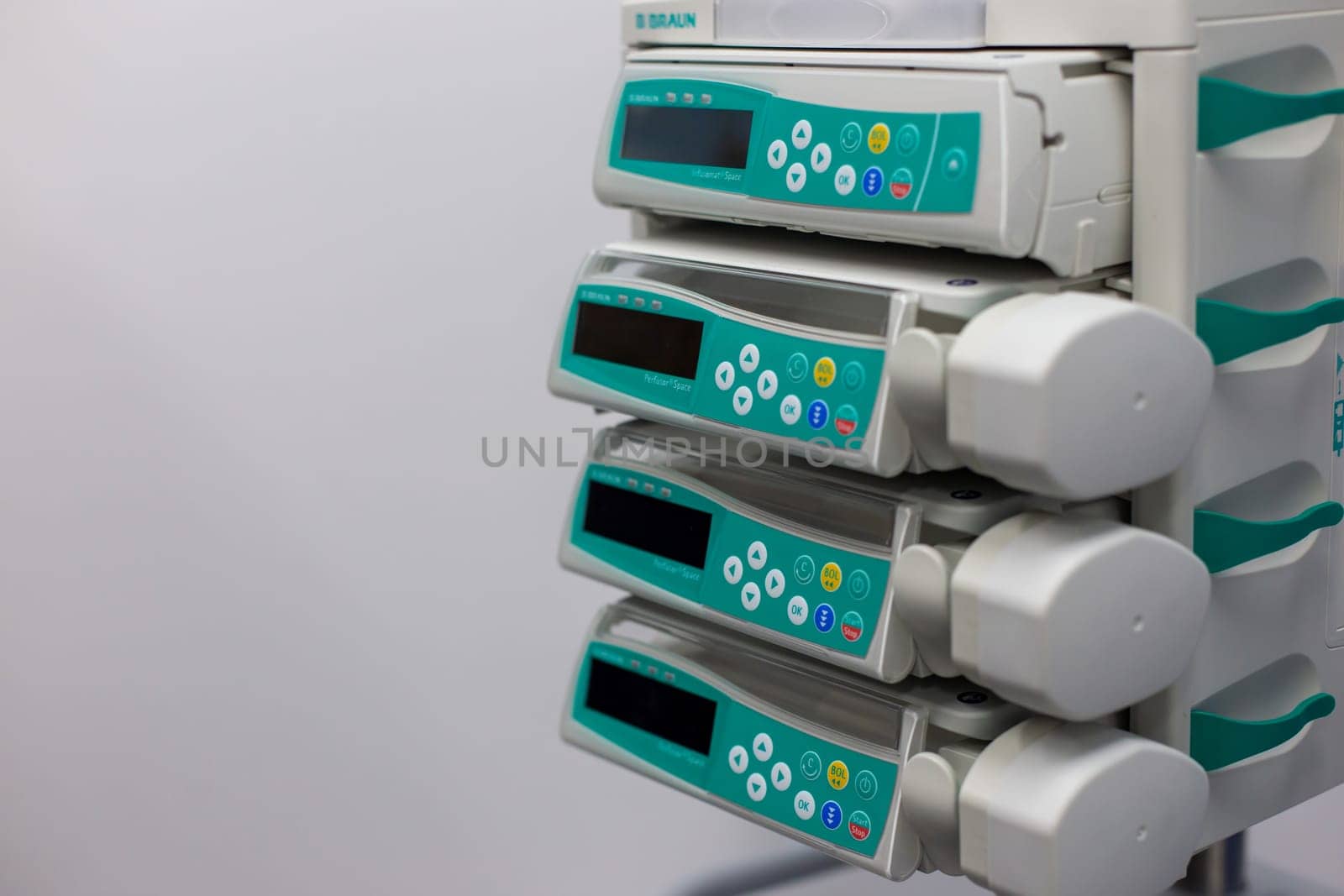 Moscow, Moscow region, Russia - 03.09.2023:Close-up view of medical infusion pumps with display screens and control buttons