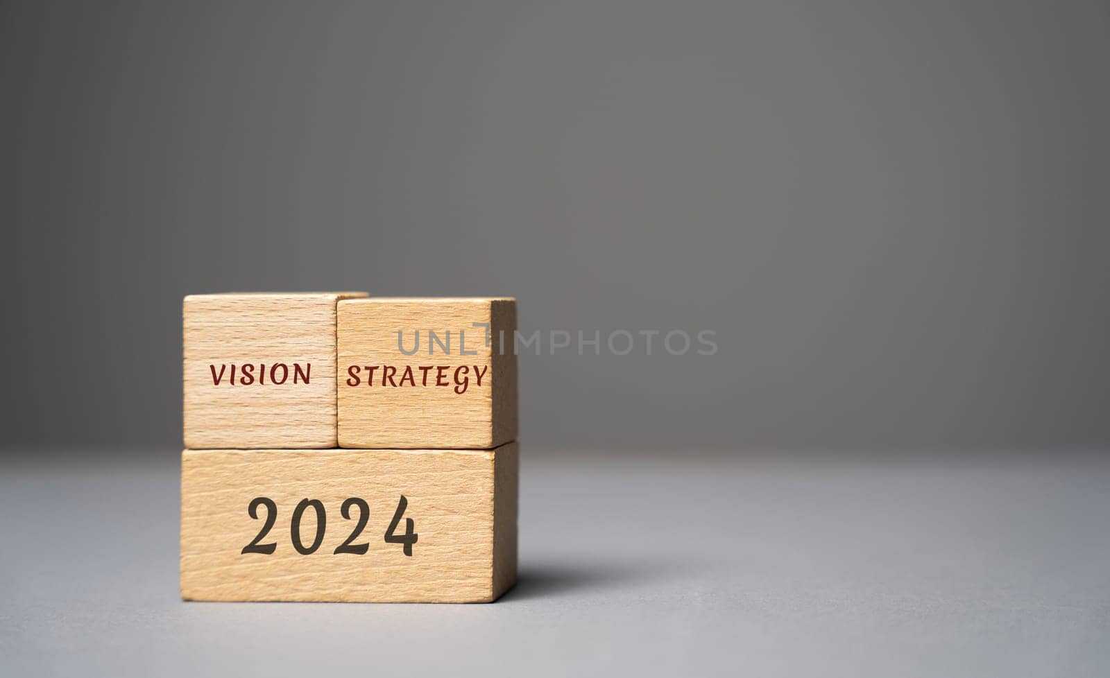 2024 vision strategy concept. Concept for business ideas and goals. Strategy development. Planning and action plan. Performance, motivation and company management. Wooden blocks, copy space