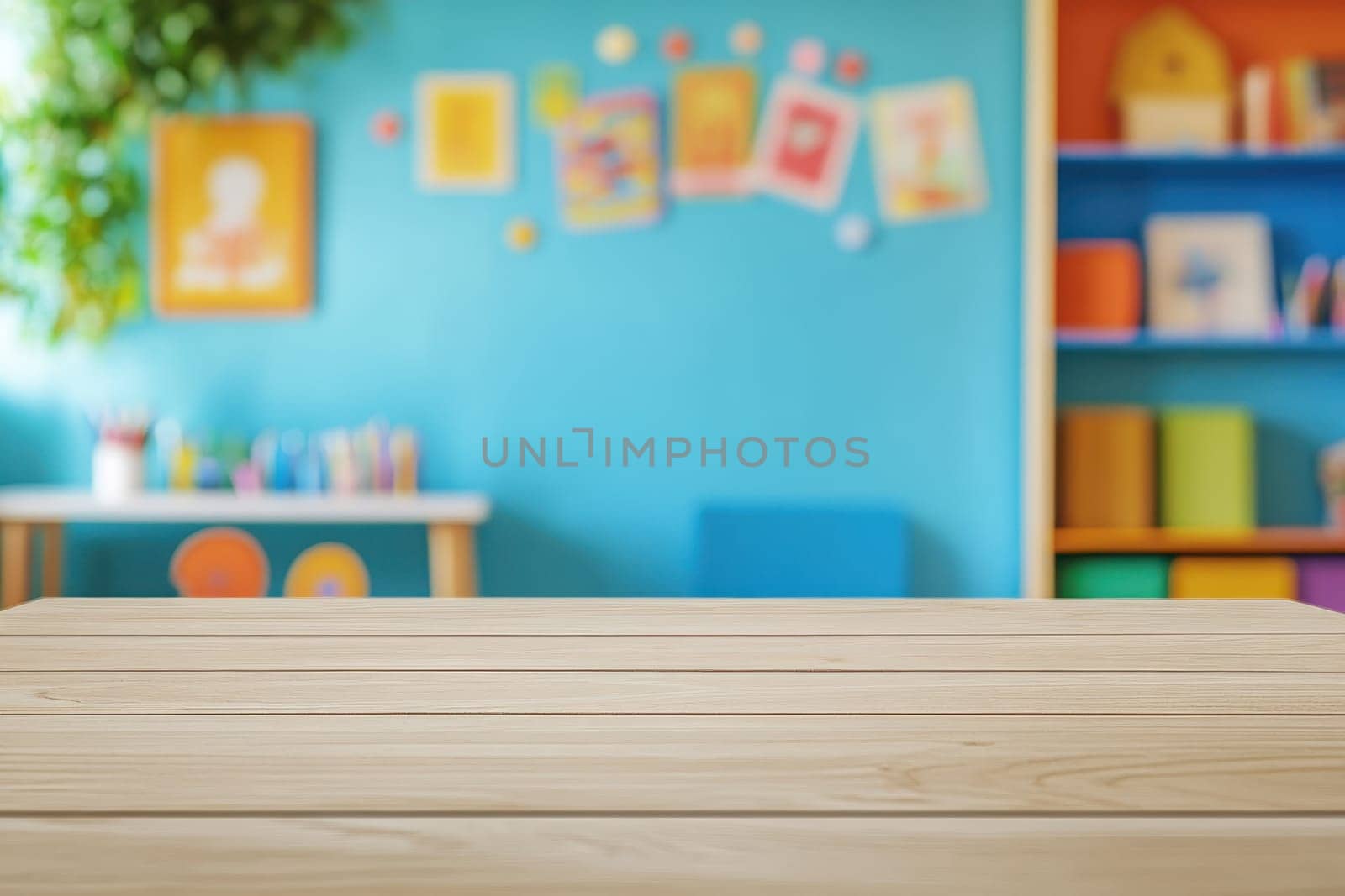 A wooden table with a blue wall behind it. The table is empty. The room is bright and colorful