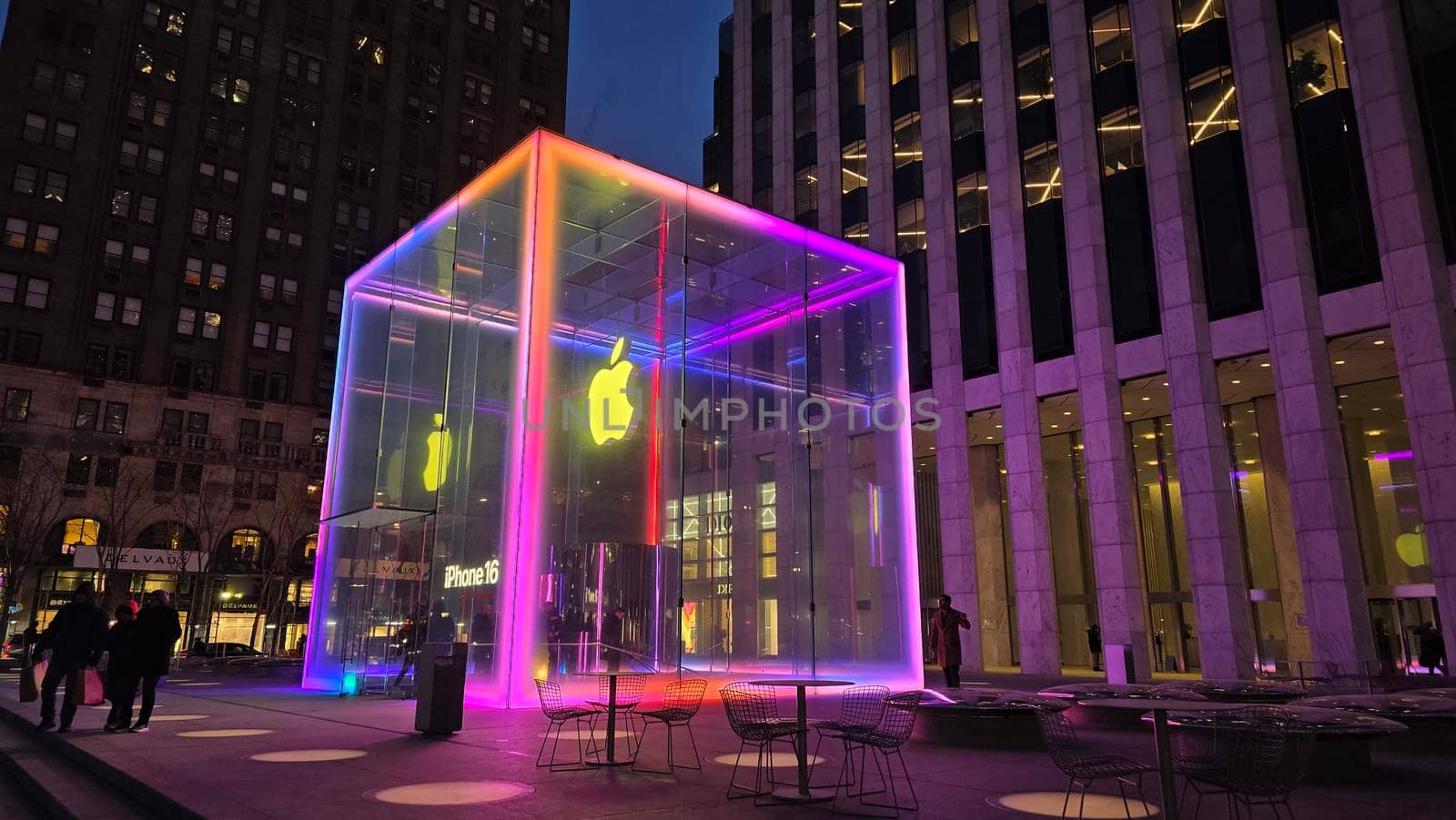 The cube, the infamous brightly illuminated glass structure for underground apple store located at fifth Avenue in New York City a 24 hours apple store in operation, good for multimedia content