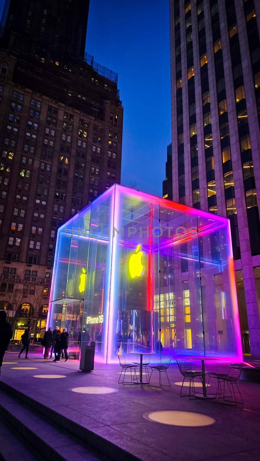 The cube, the infamous brightly illuminated glass structure for underground apple store located at fifth Avenue in New York City a 24 hours apple store in operation, good for multimedia content