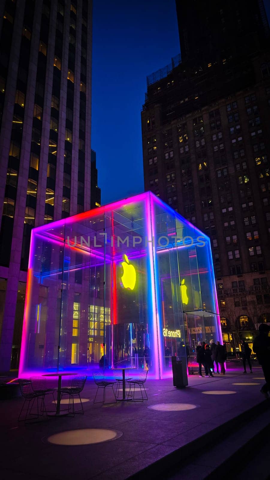 The cube, the infamous brightly illuminated glass structure for underground apple store located at fifth Avenue in New York City a 24 hours apple store in operation, good for multimedia content
