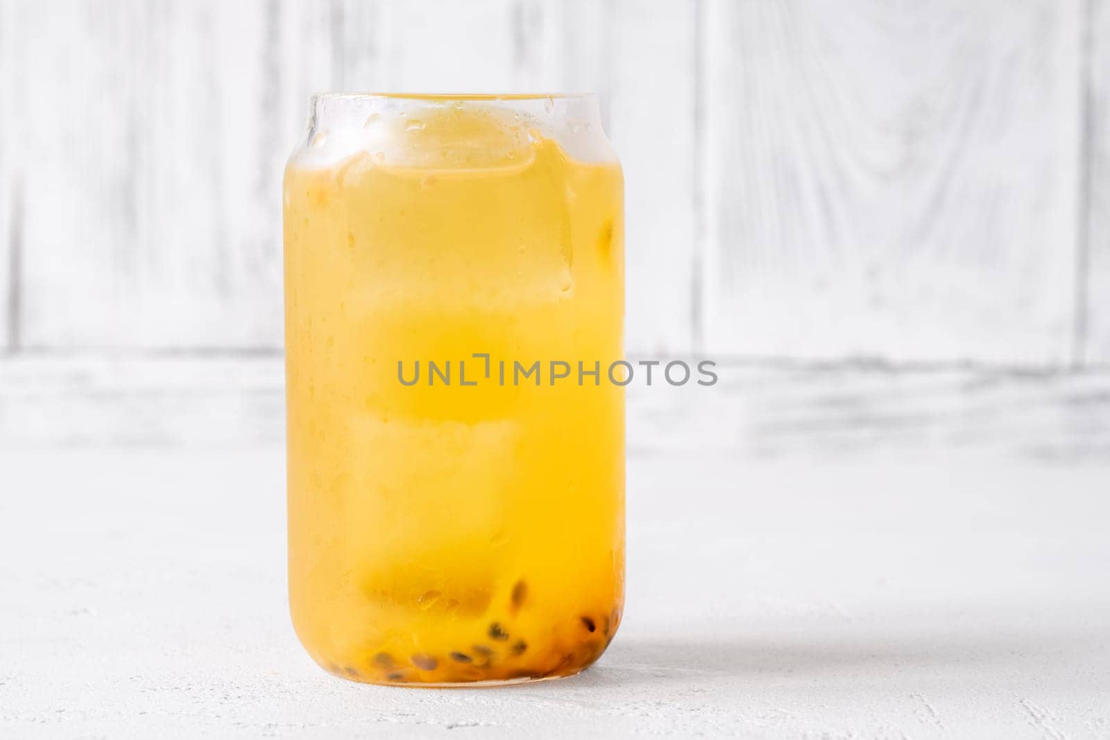 Unique Waltzing Matilda cocktail with passion fruit, gin, sauvignon blanc, orange curacao