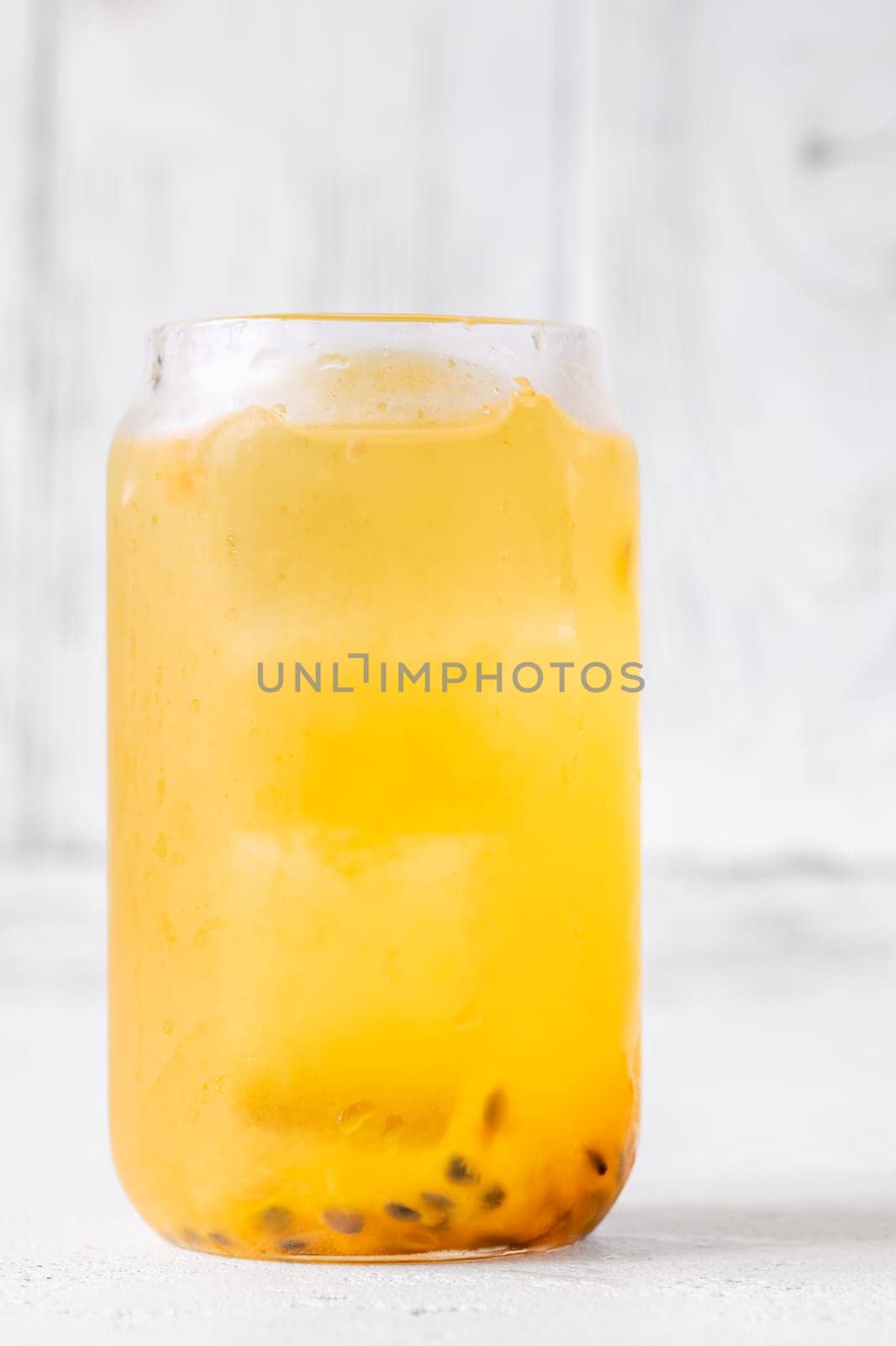 Unique Waltzing Matilda cocktail with passion fruit, gin, sauvignon blanc, orange curacao