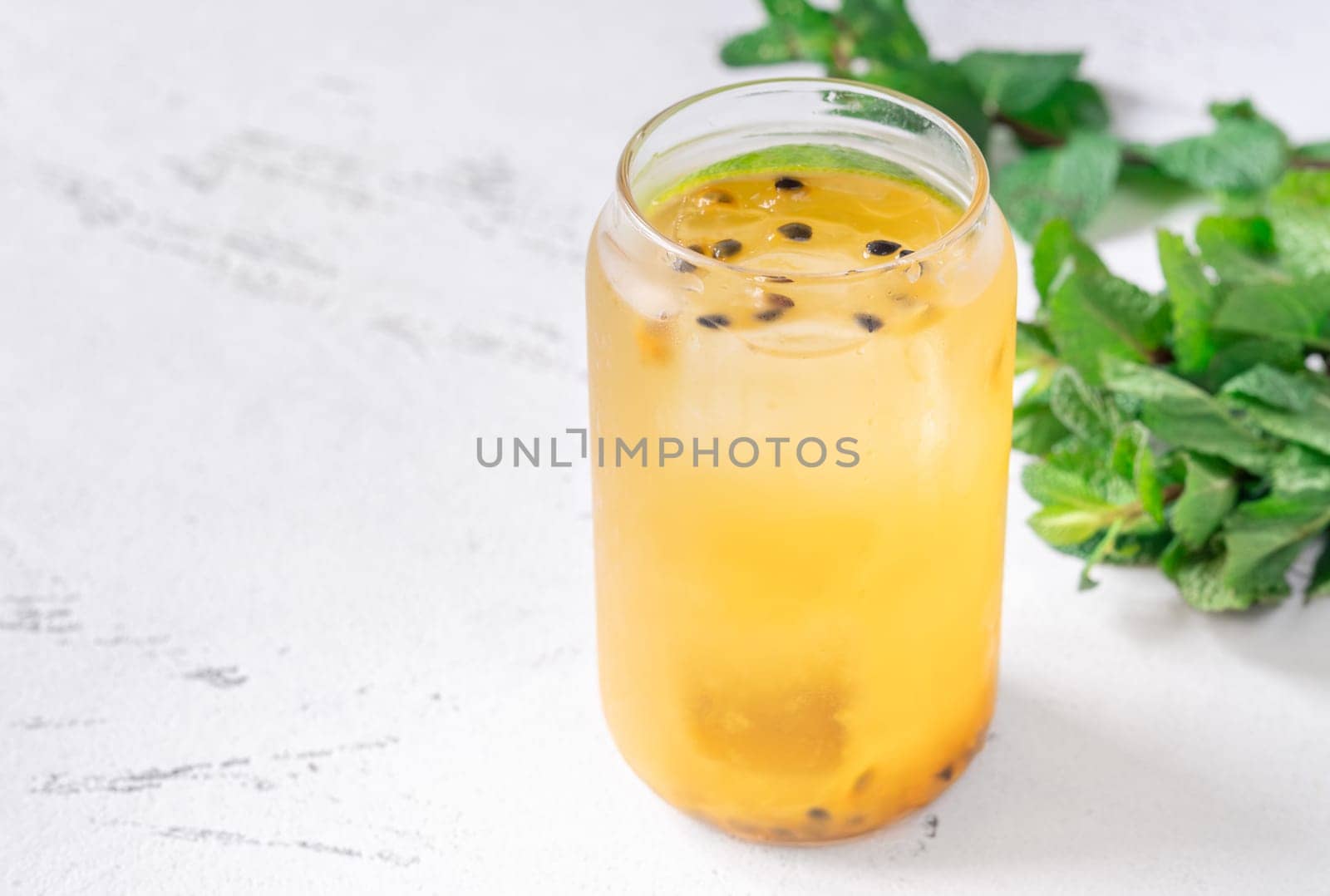 Unique Waltzing Matilda cocktail with passion fruit, gin, sauvignon blanc, orange curacao