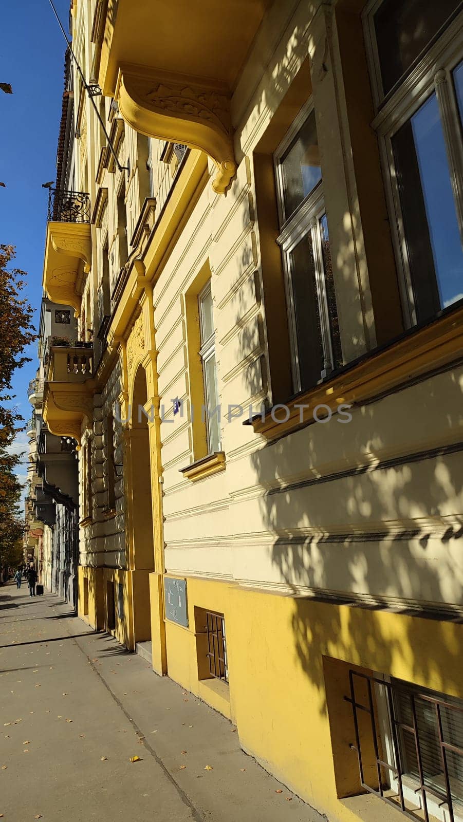 Yellow building street architecture old city centre toun culture autumn October 15 2024 Prague Czech Republic Europe. High quality photo window