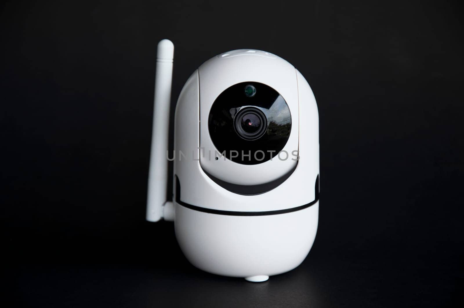 IP camera placed on black background by boonruen