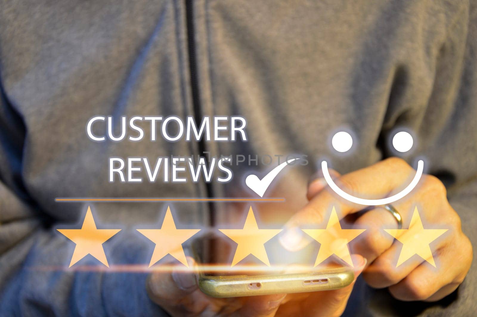 Customers rate service of Businessmen choose to rate 5 stars using smart phone and give five star symbol. Excellent rating. User give rating, feedback, good business network score by boonruen