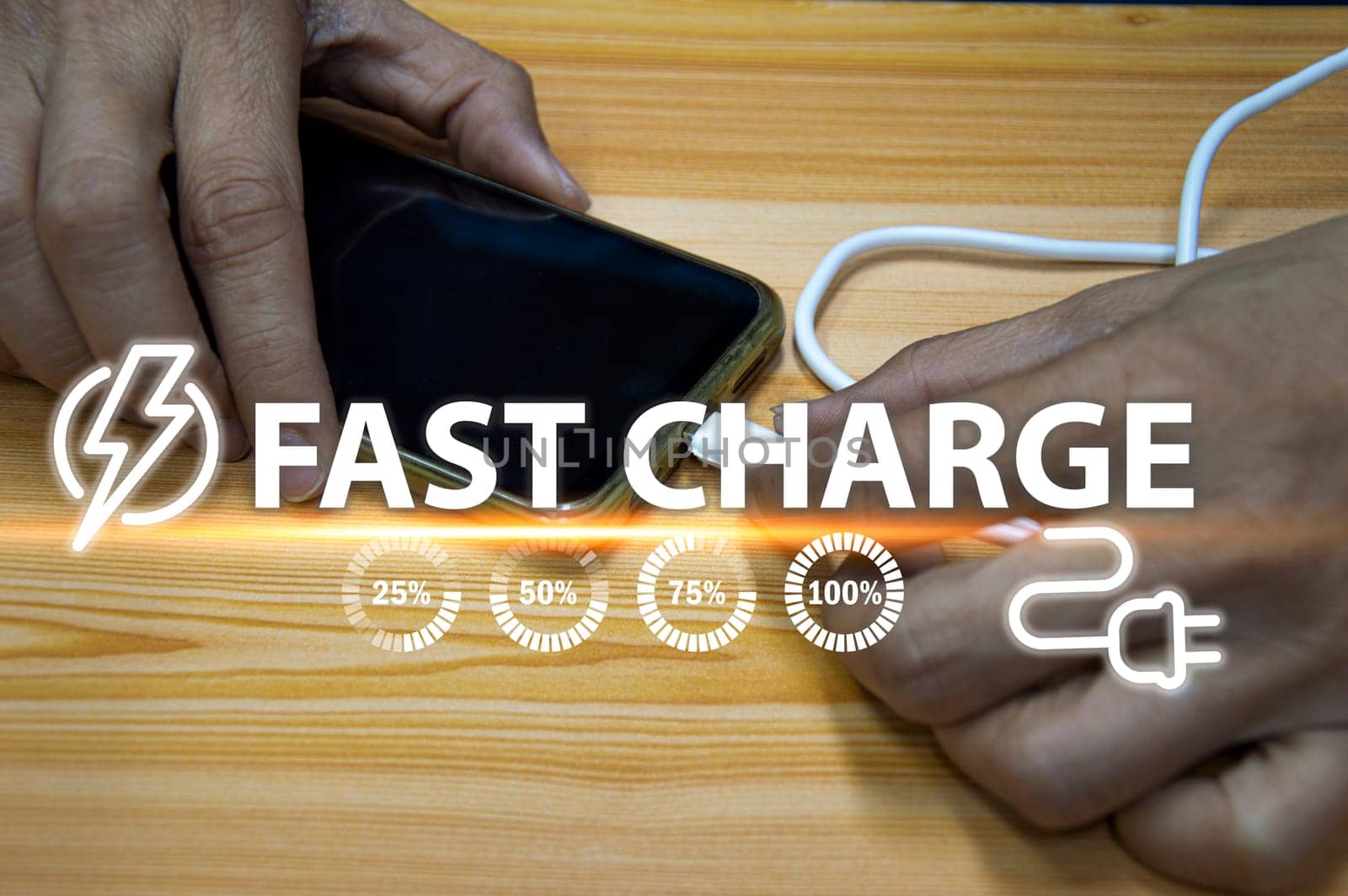 The concept of using a fast charger with a smartphone by boonruen