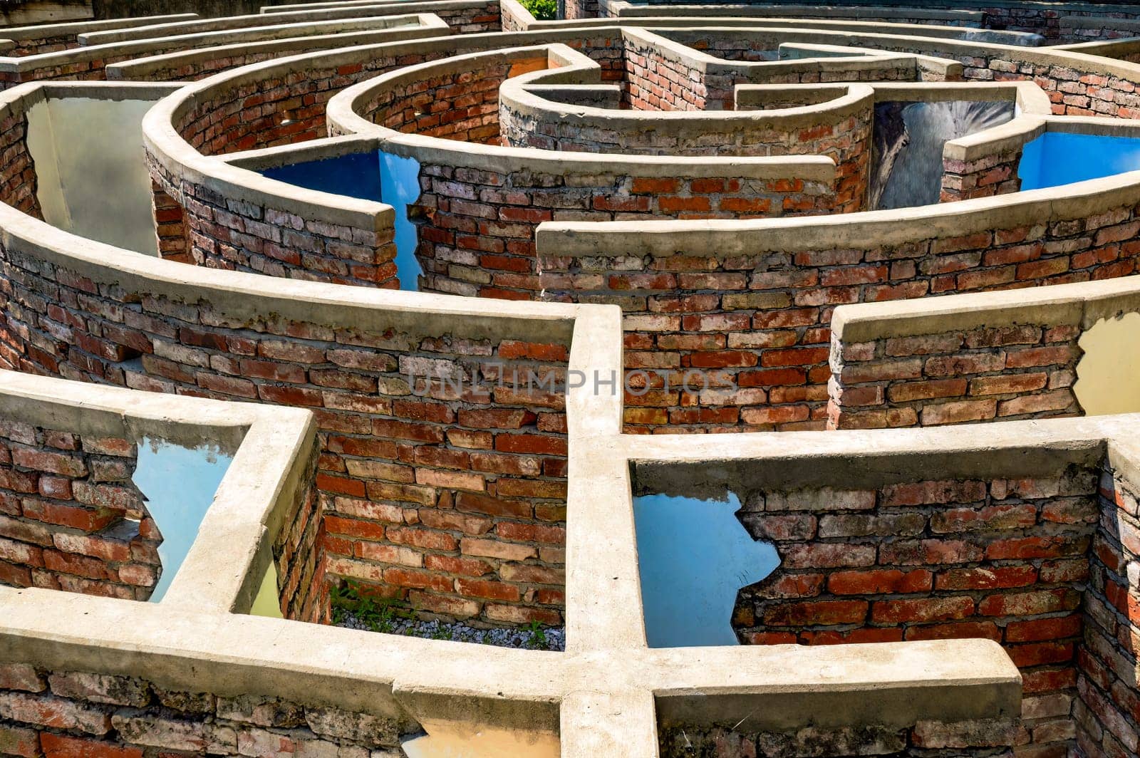 Old dilapidated brick labyrinth. Retro style, vintage. view from above