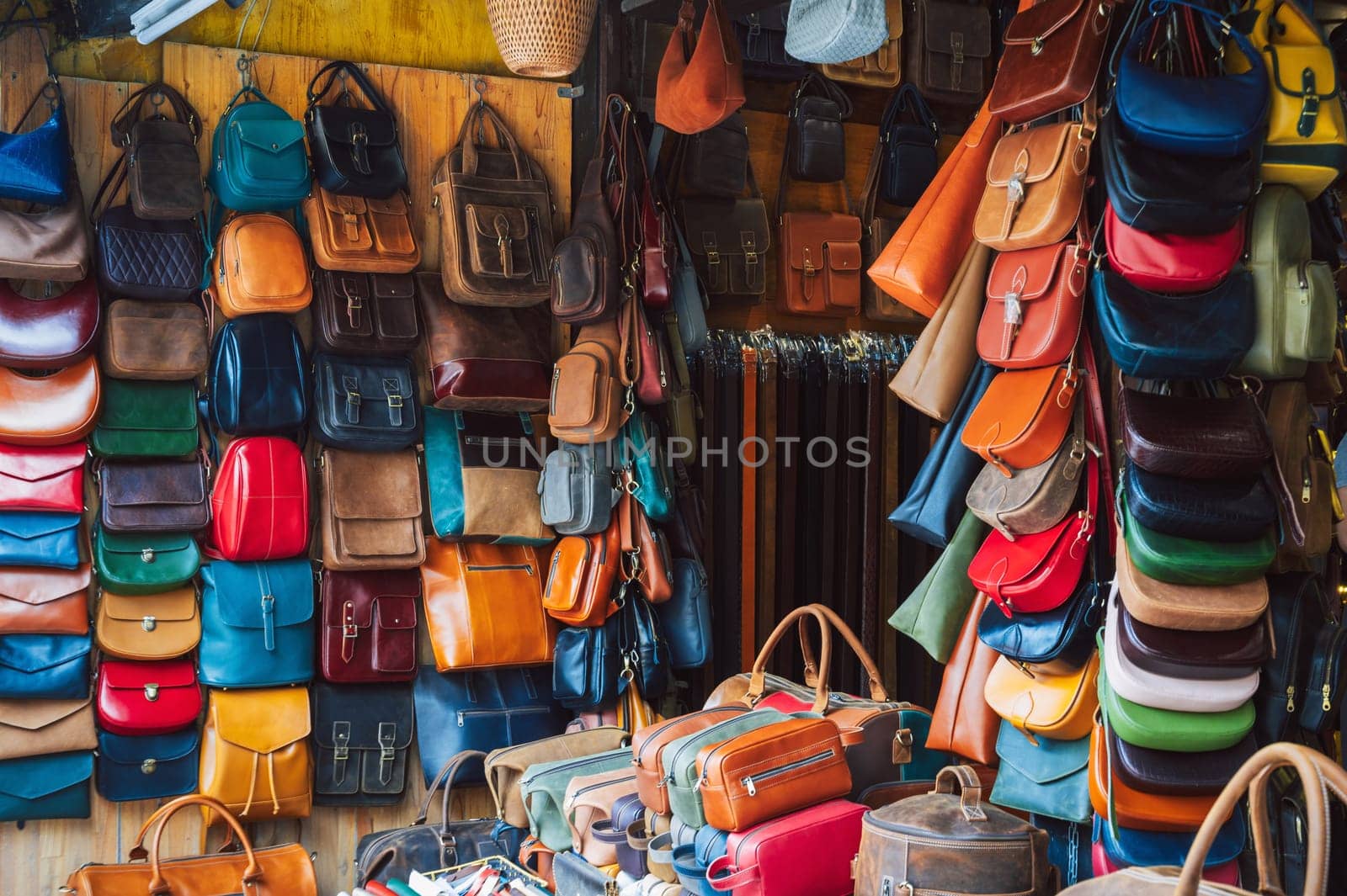 handmade genuine leather bags and accessories store at Hoi An Street market in Vietnam in Asia
