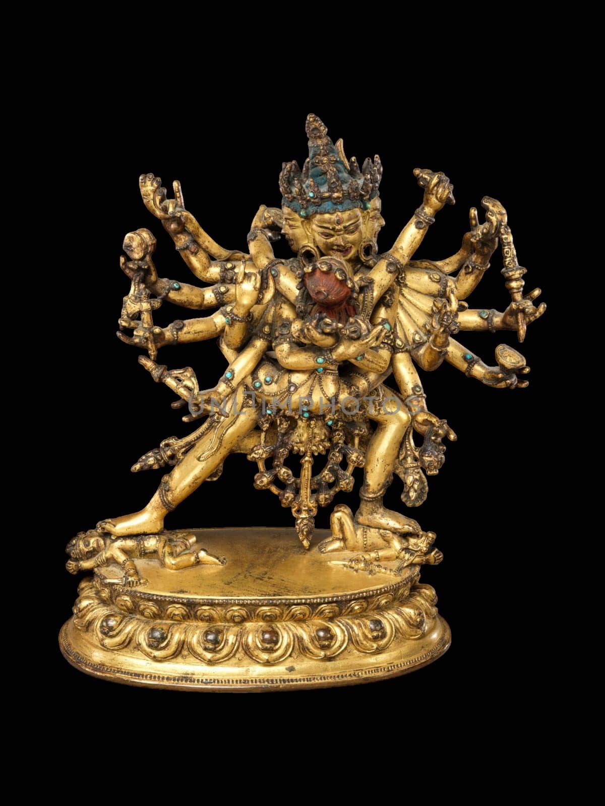 A detailed and vibrant Tibetan Buddhist sculpture of Chakrasamvara and Vajravarahi, showcasing intricate iconography and spiritual symbolism from the late 15th-16th century.