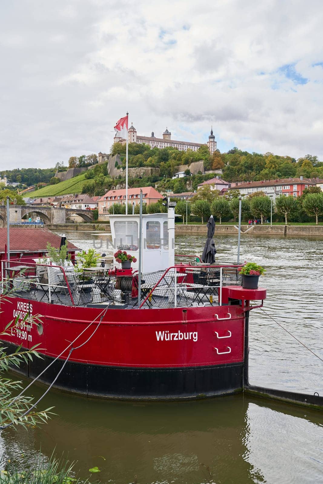 Wuerzburg, Germany – September 27, 2024: the Main Kutter, a popular restaurant on a ship on the River Main near Wurzburg