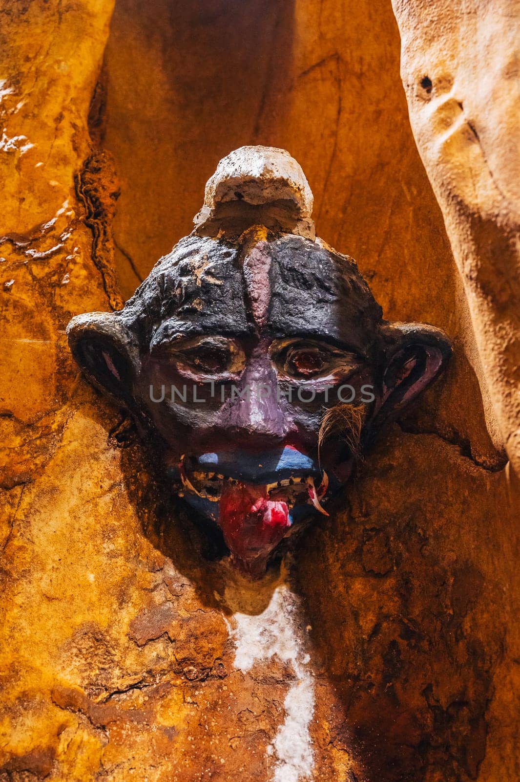 An ancient mystical ritual death mask in the Am Phu cave in the Marble Mountains in Da Nang, Vietnam, Asia