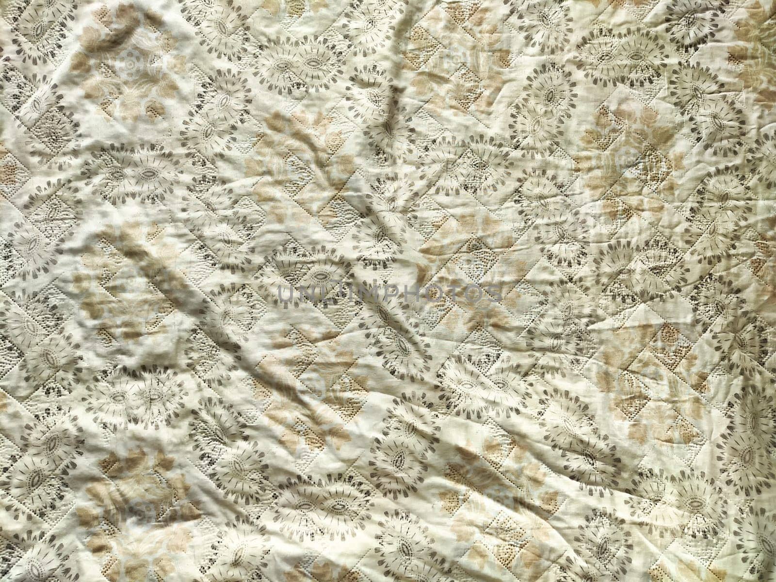 Soft, textured fabric features a delicate pattern ideal for creative projects requiring a customizable background or decorative element.