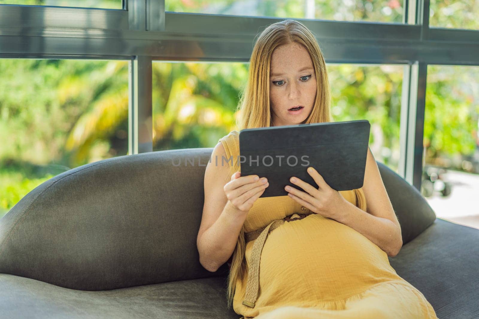 A pregnant woman receives concerning blood test results, her face reflecting worry and concern about her and her baby's health by galitskaya