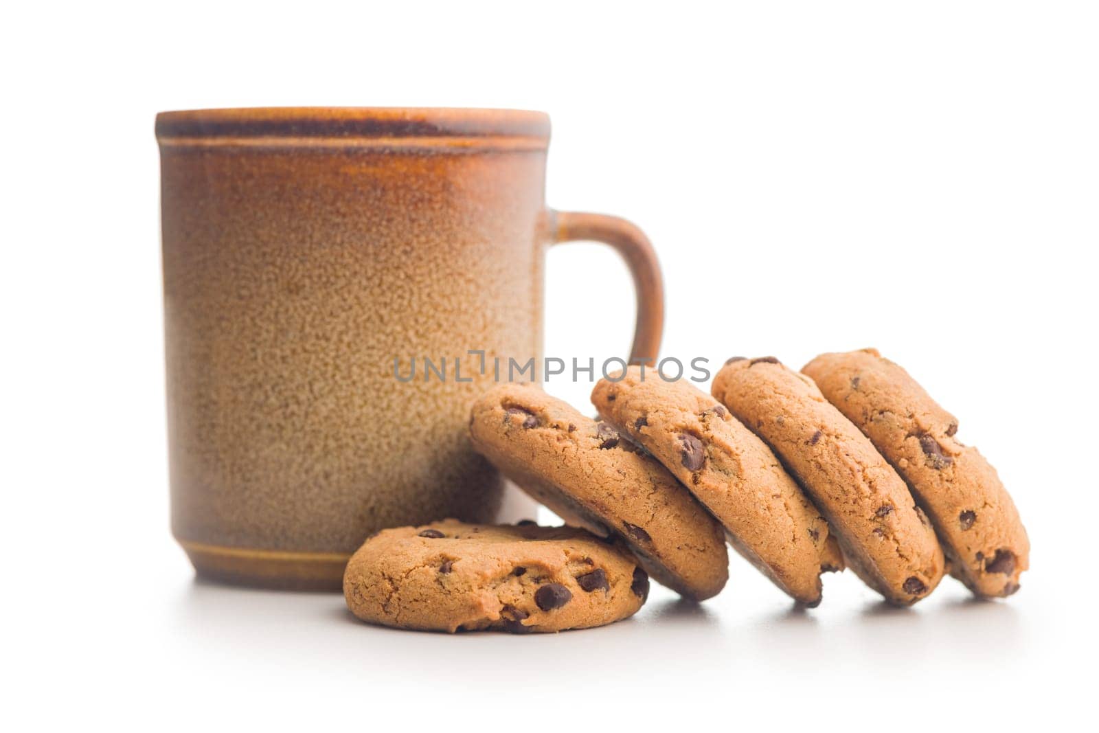 Chocolate chip cookies and mug  isolated on a white background.