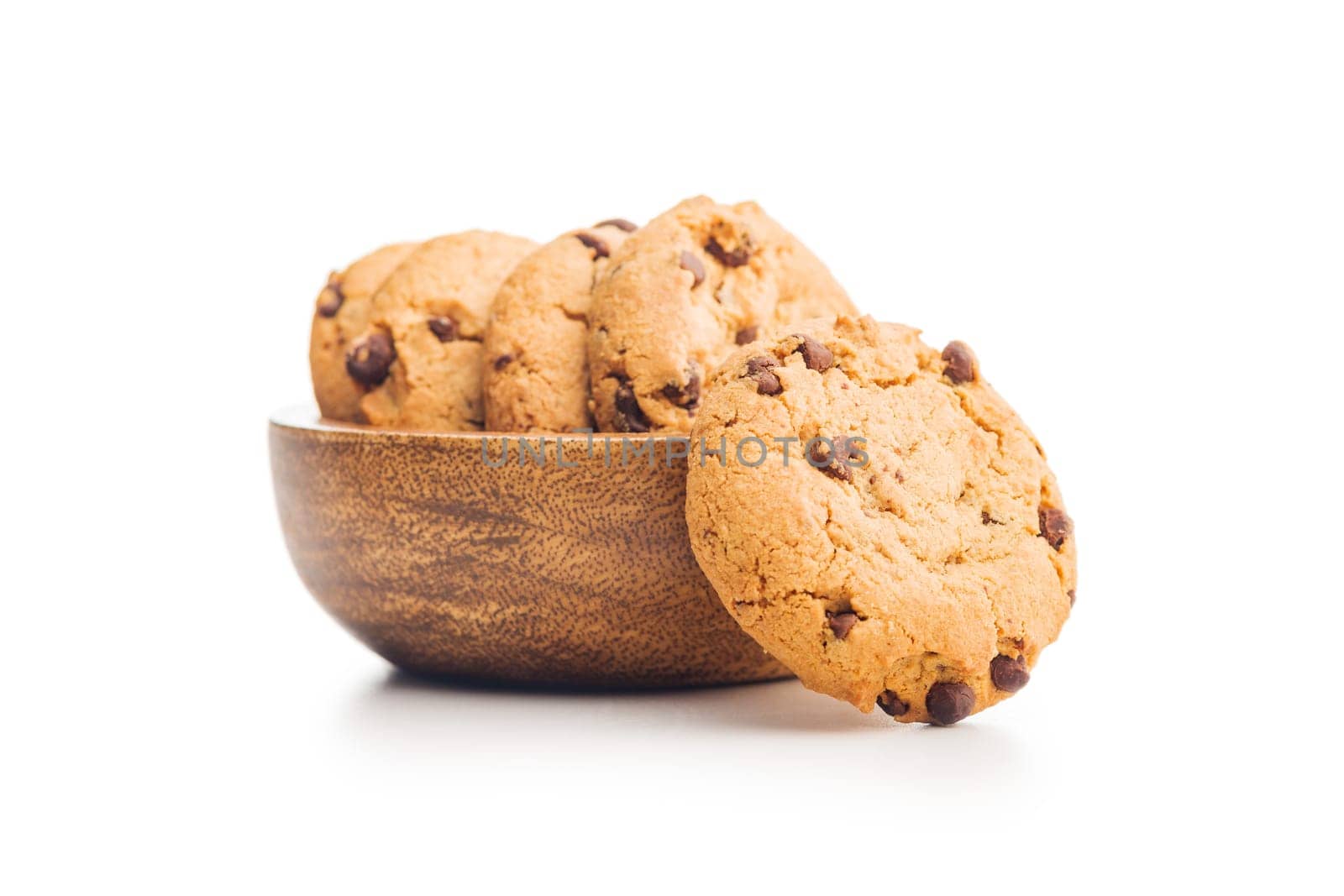 Chocolate chip cookies in bowl isolated on a white background.