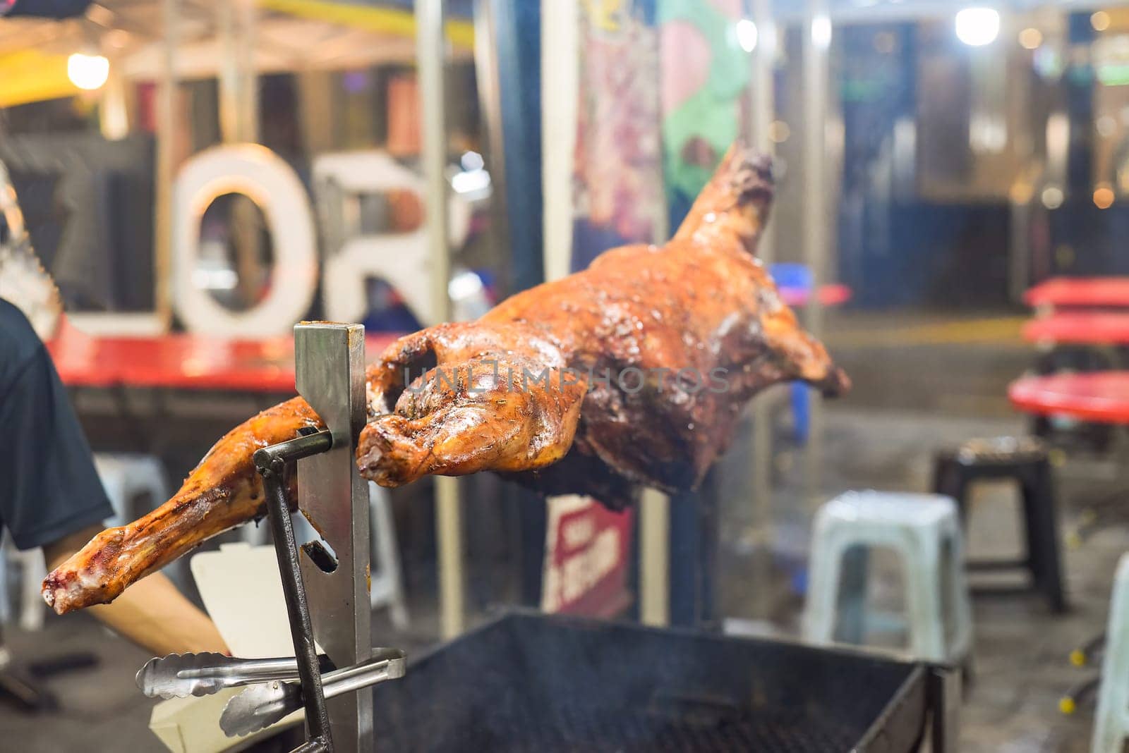Grilled lamb bbq on grill in Jalan Alor street food in Kuala Lumpur