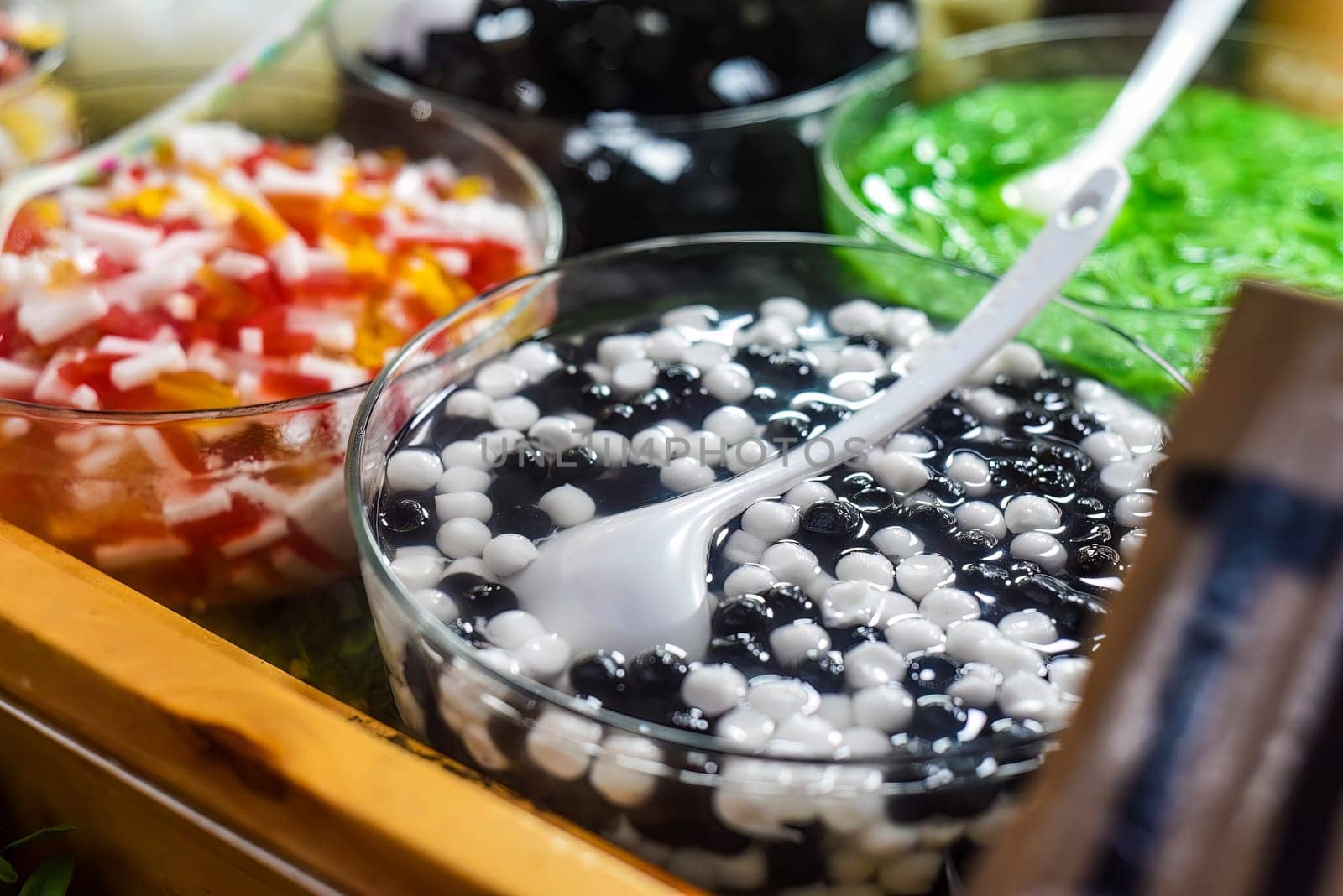 Many Thai tea additives in Jalan Alor street food in the Kuala Lumpur market