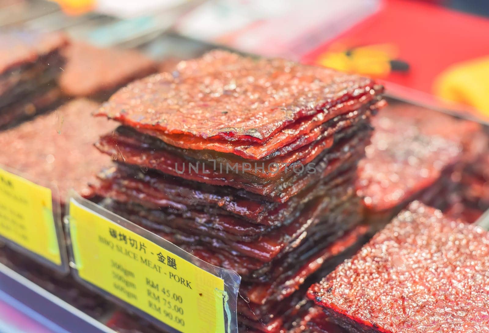 Bbq slice meat pork in the street food Jalan Alor in Kuala Lumpur