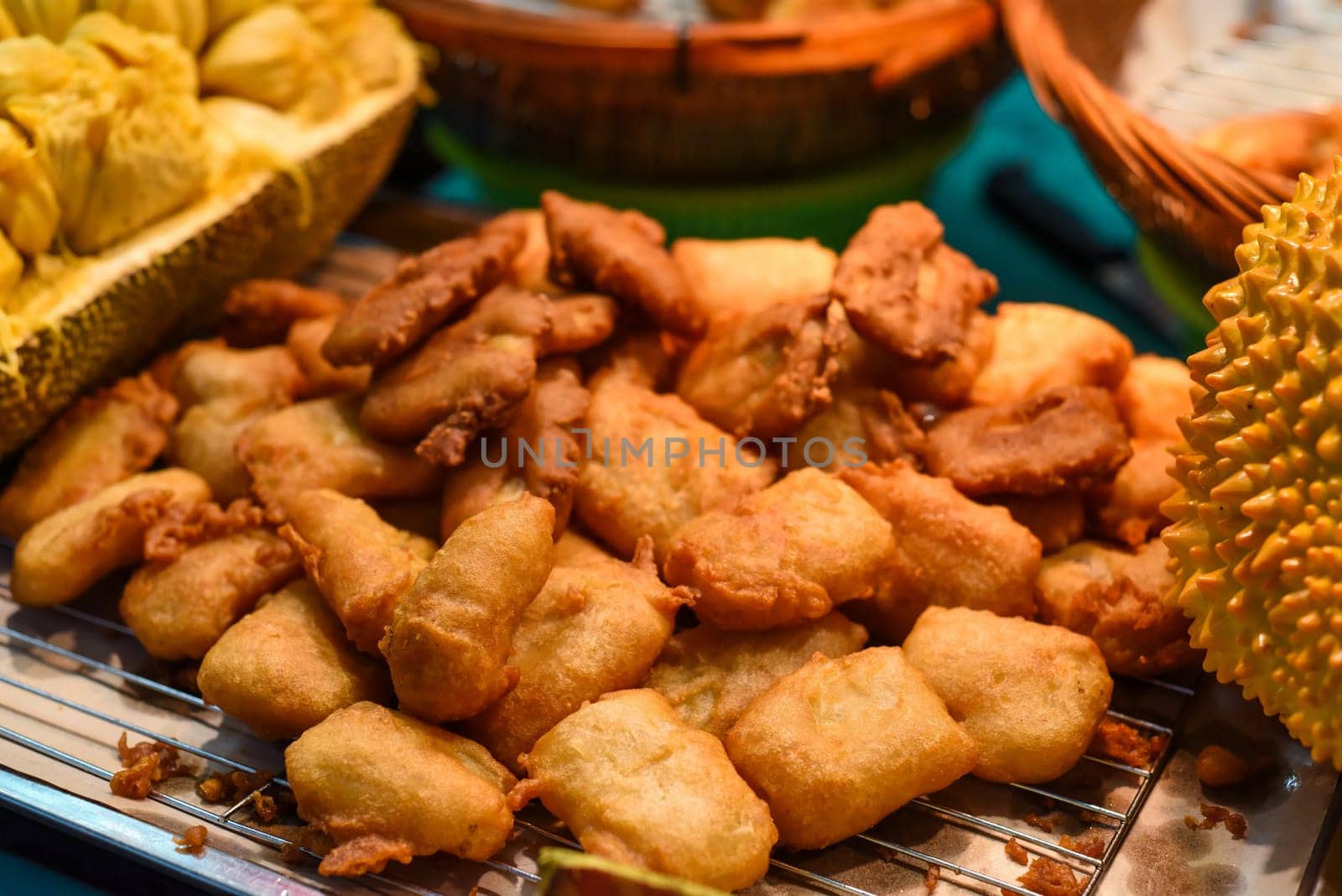 Fried durian in the street food Jalan Alor in Kuala Lumpur