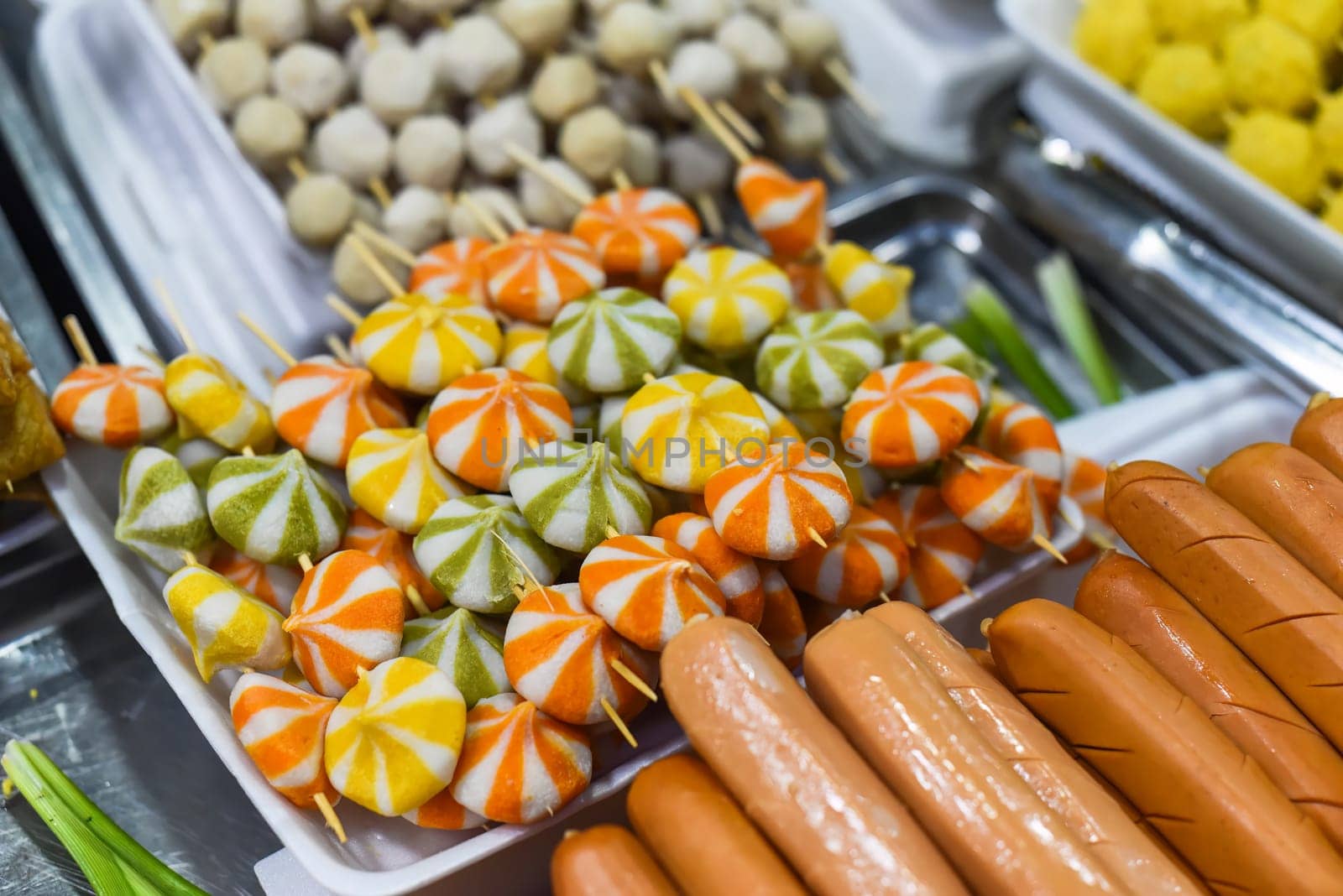 Many snacks and seafood in vietnamese night market in food festival