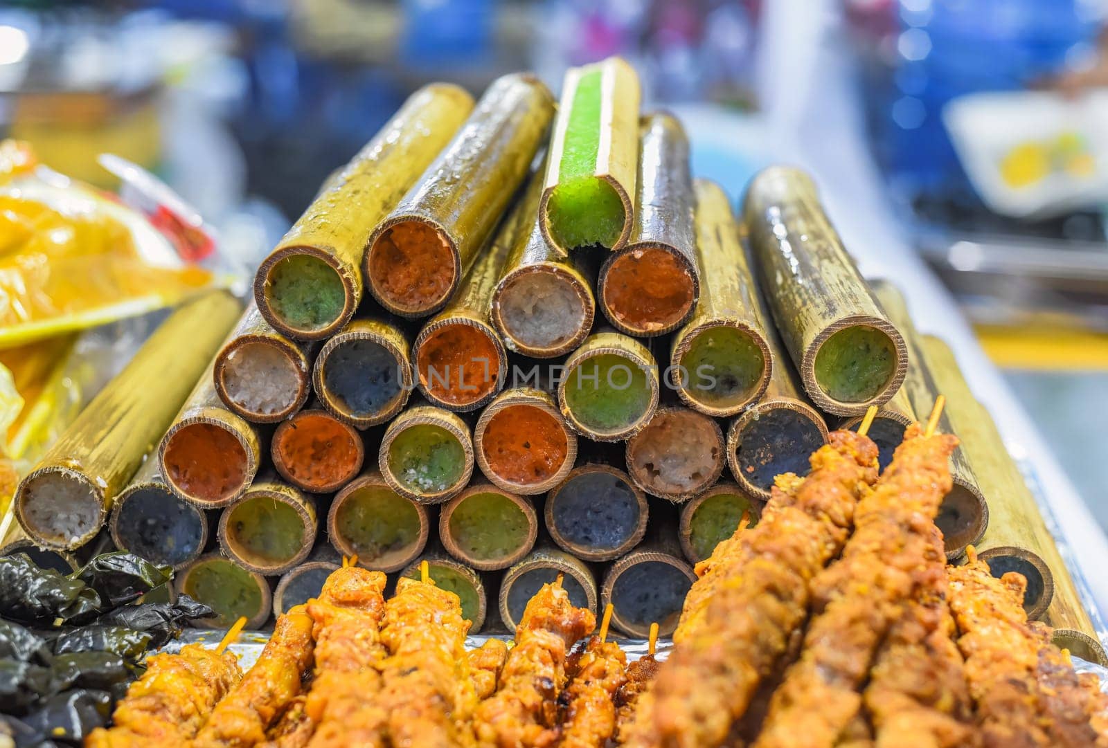 Colorful sticky rice in bamboo in vietnamese night market