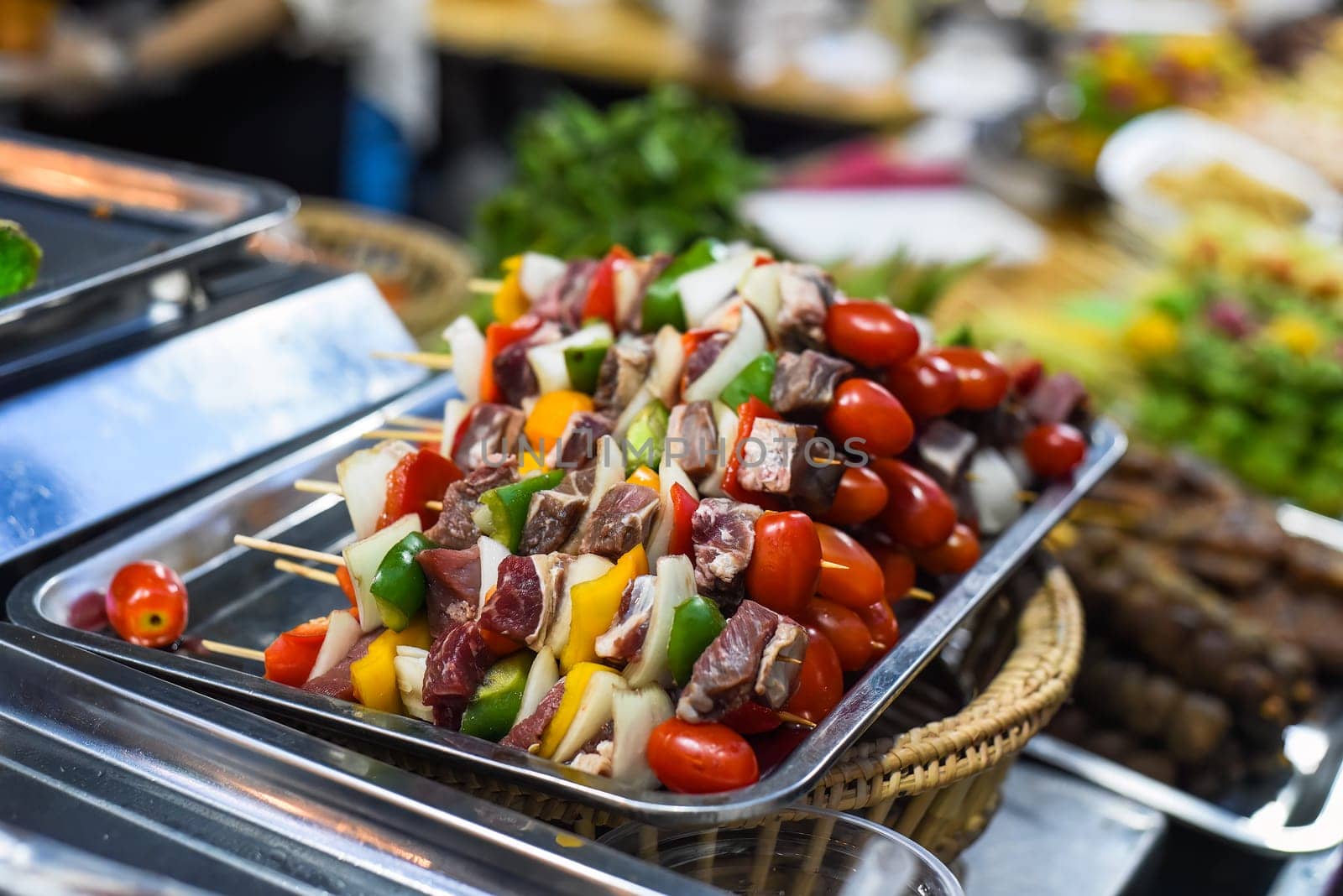 Raw shashlik with vegetables before grill