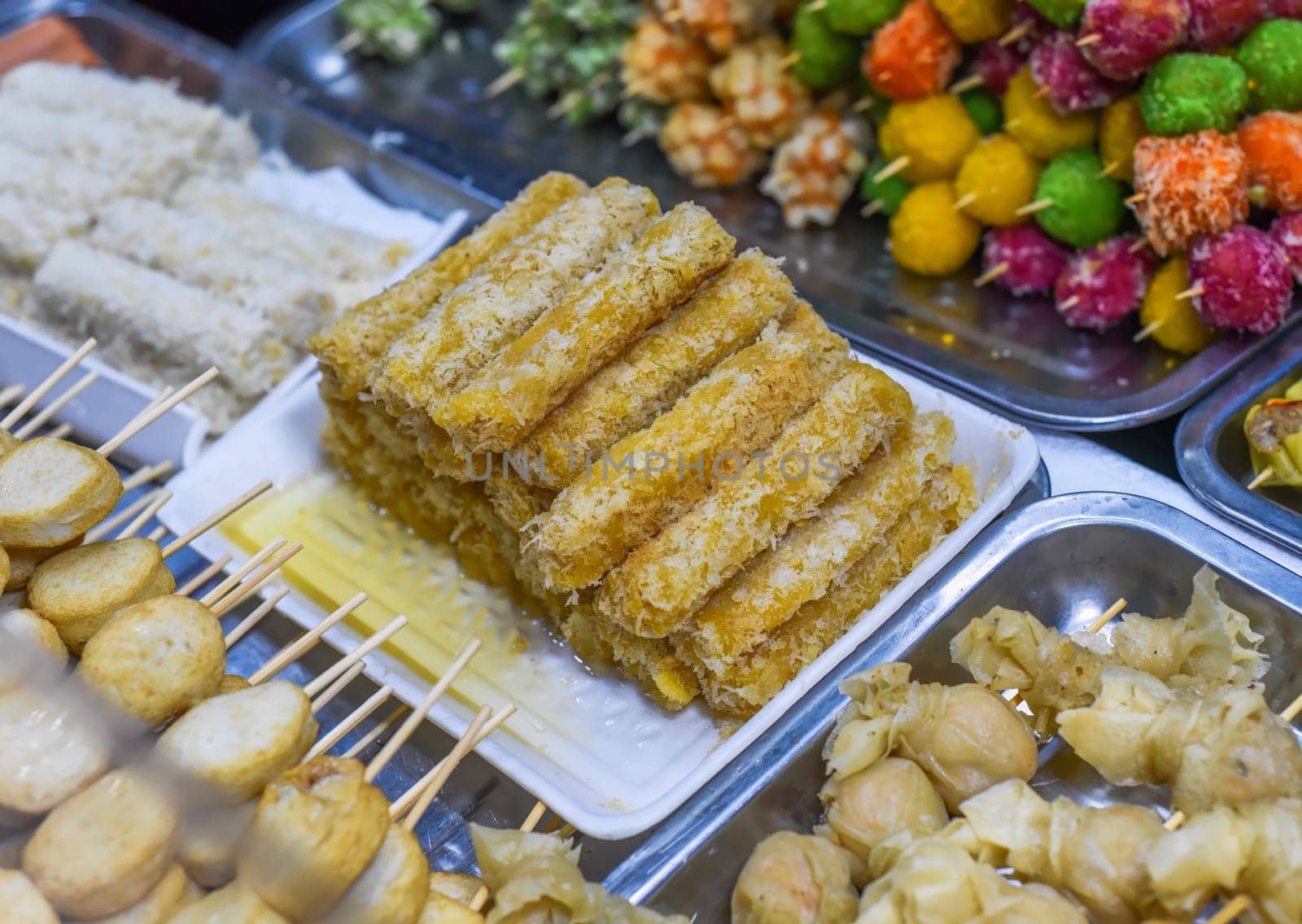 Many snacks and seafood in vietnamese night market in food festival